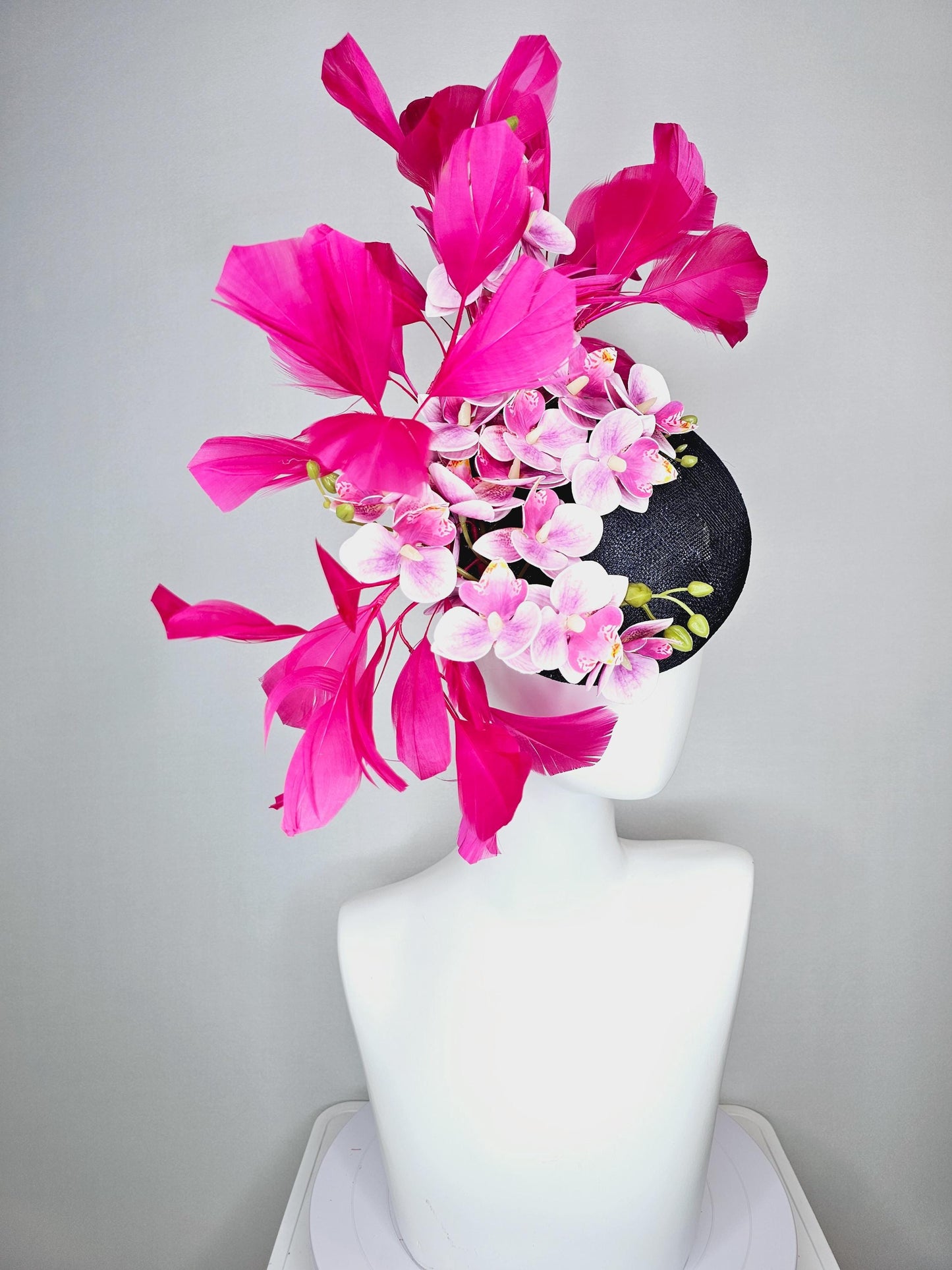 kentucky derby hat fascinator navy blue sinamay with white and blush pink satin orchid flowers and hot pink branching feathers