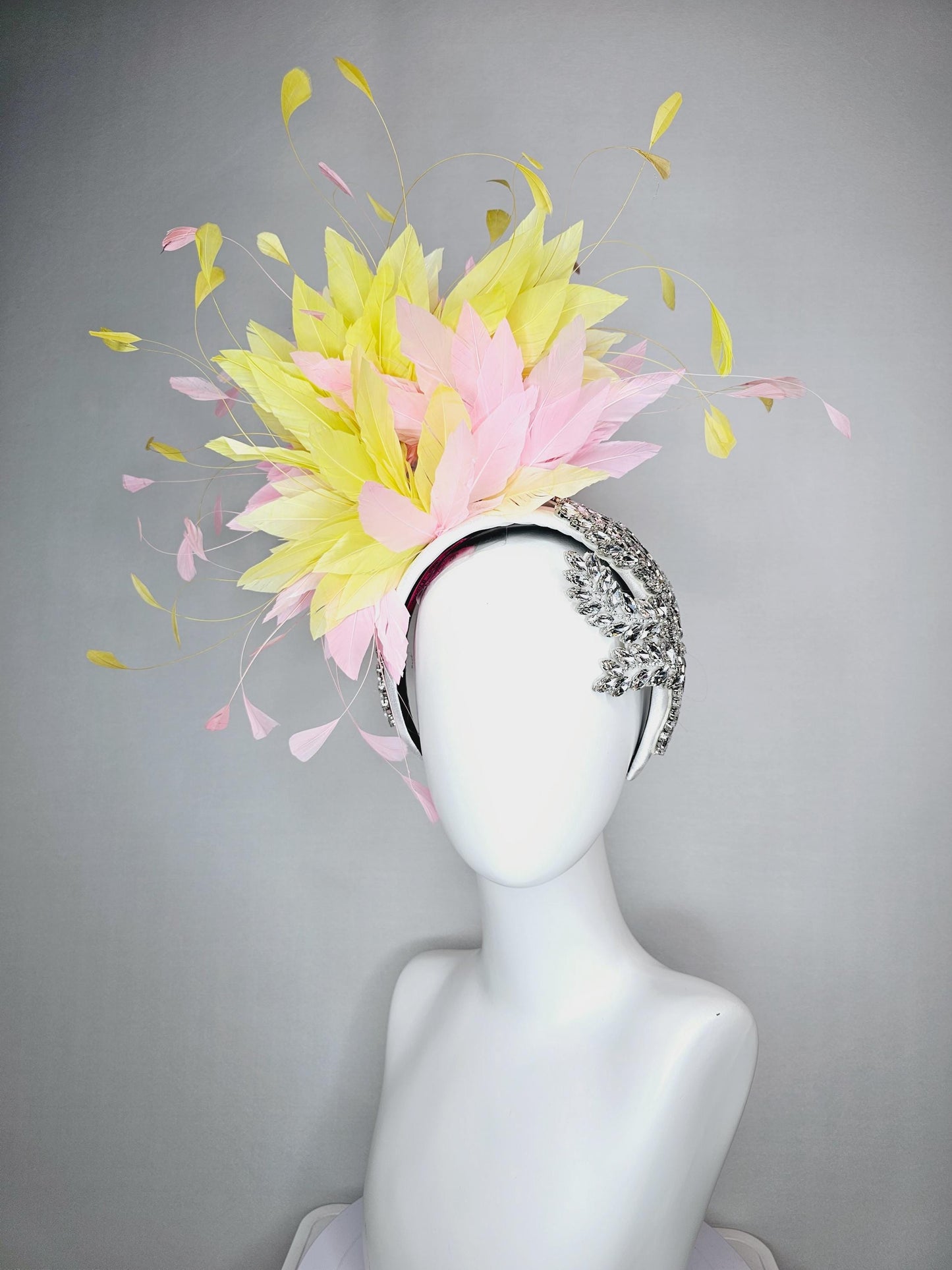 kentucky derby hat fascinator white headband with large clear crystal rhinestone beaded stems and light pink yellow branching feathers