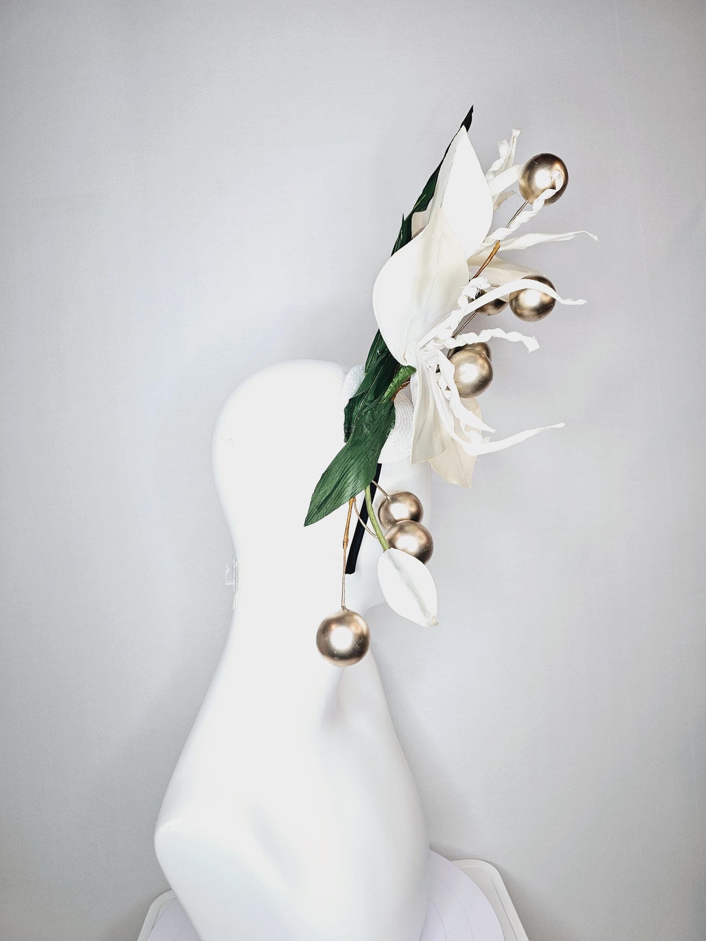 kentucky derby hat fascinator large ivory white satin silk flowers with large dark green leaves and gold pearls