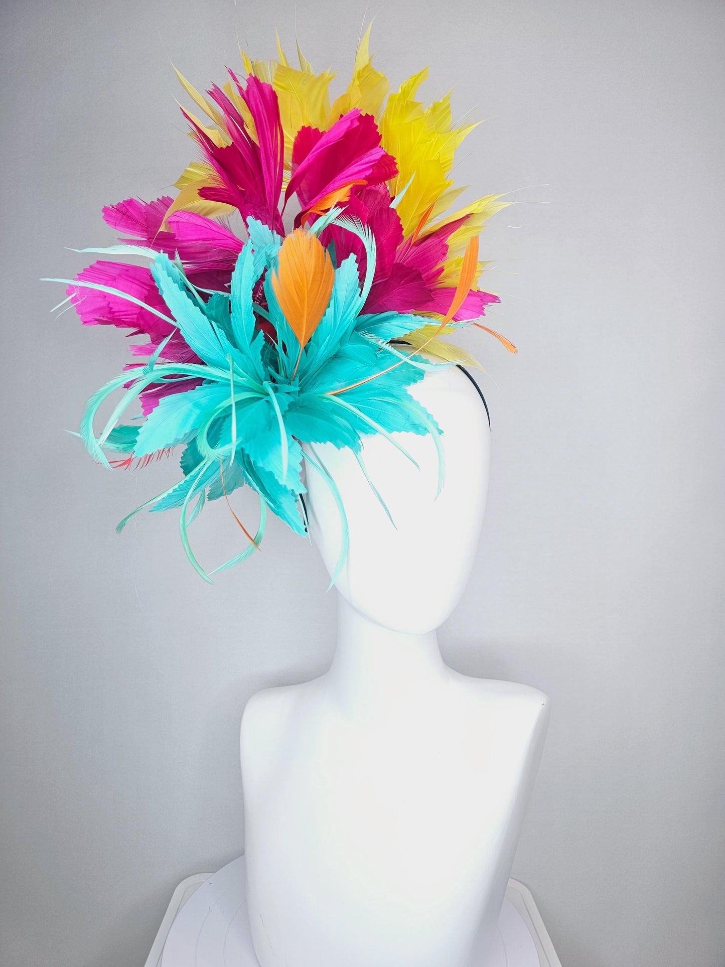 kentucky derby hat fascinator colorful fluffy aqua blue zigzag feather flower and hot pink fuchsia cherry red yellow branching feathers