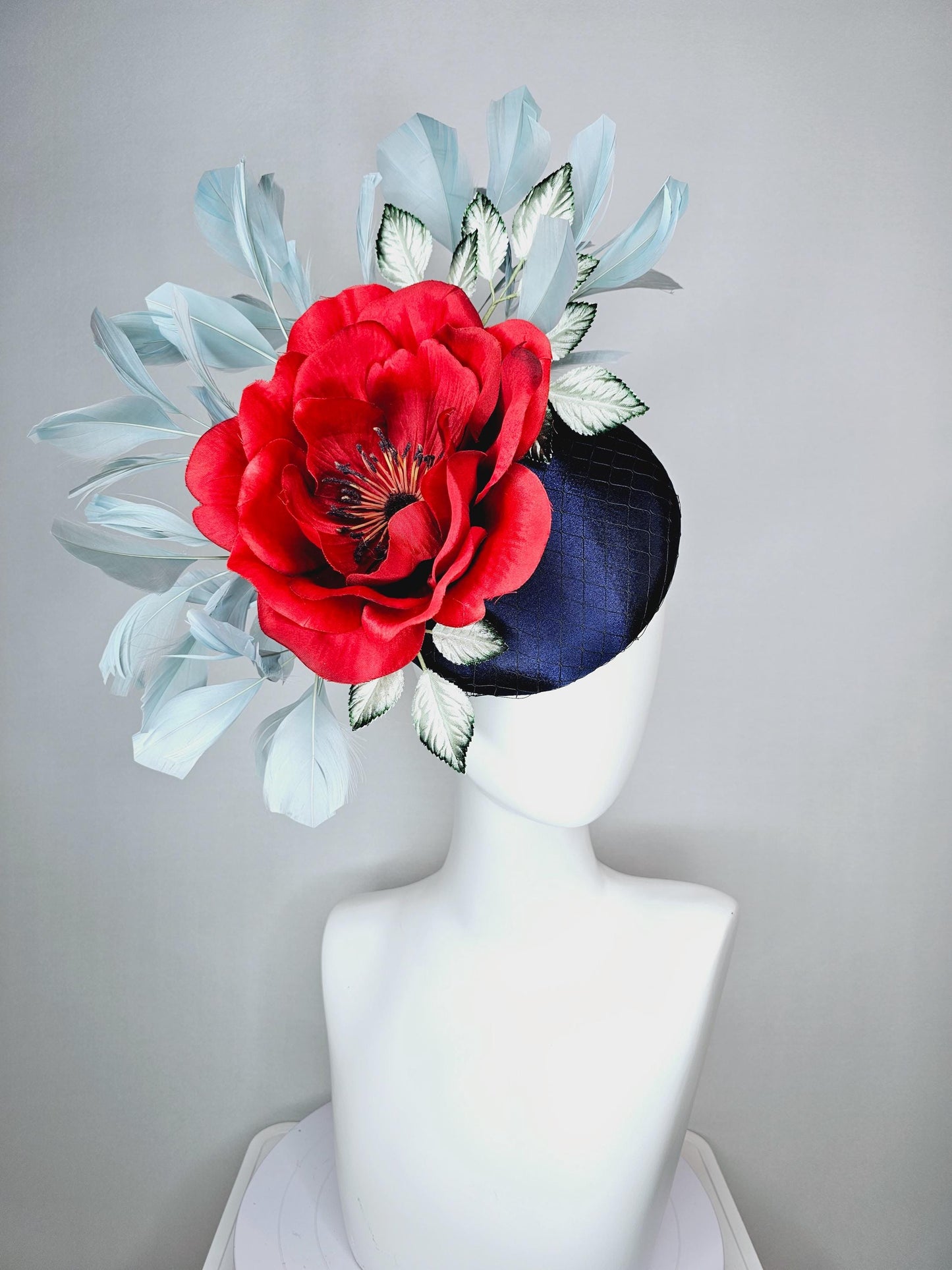 kentucky derby hat fascinator navy blue satin with netting red satin rose flower ombre green leaves with light teal blue branching feathers