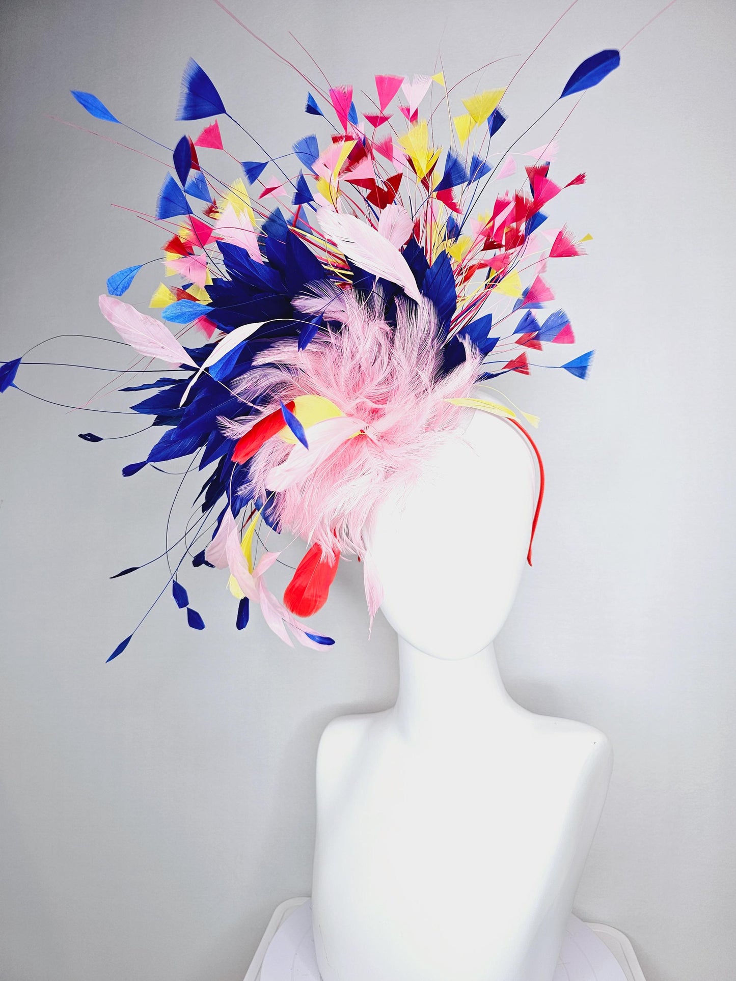 kentucky derby hat fascinator light pink and red feather flowers with colorful light pink yellow royal cobalt blue red branching feathers