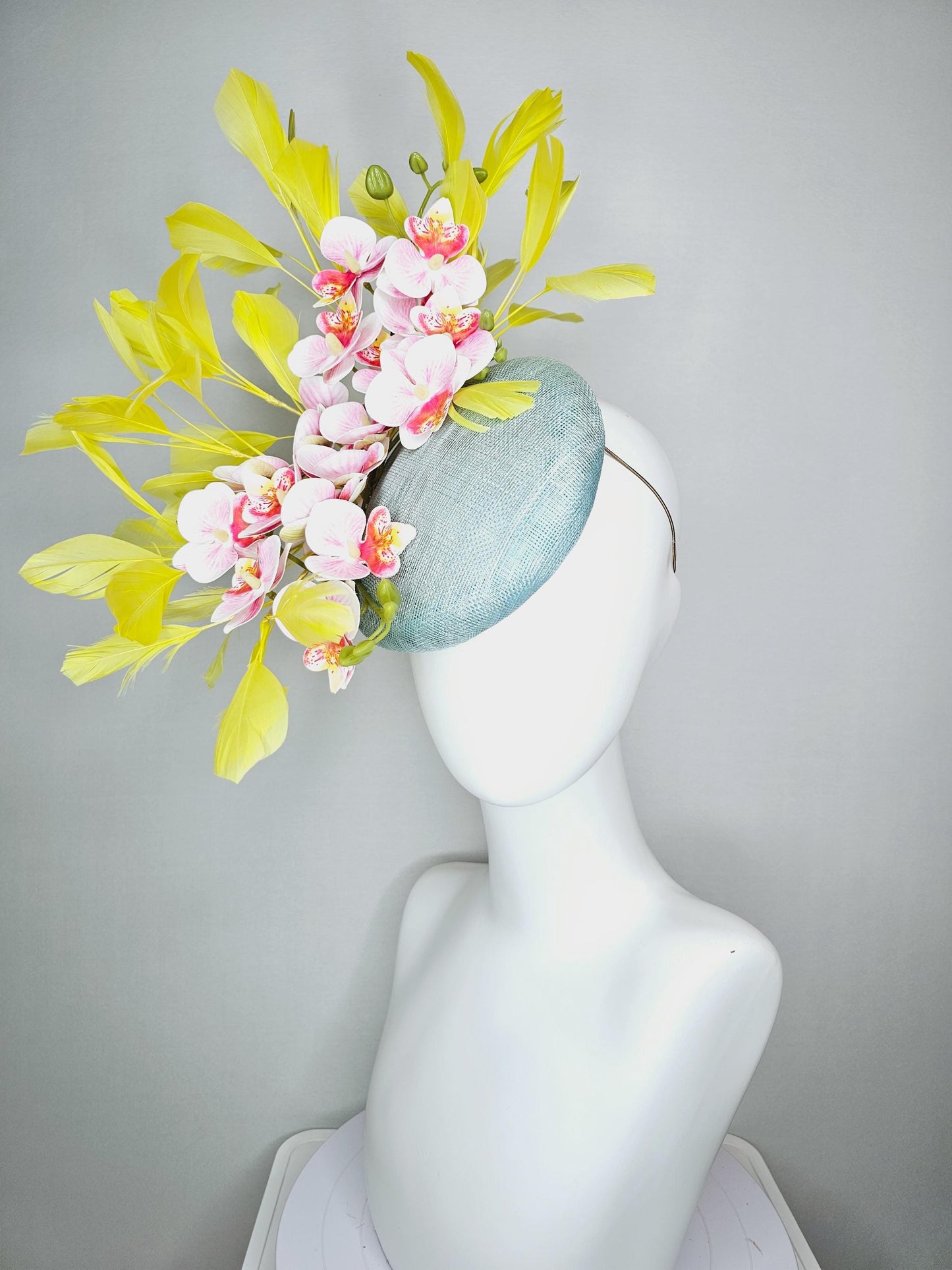 kentucky derby hat fascinator light blue sinamay with white blush pink satin orchid flowers with yellow branching feathers