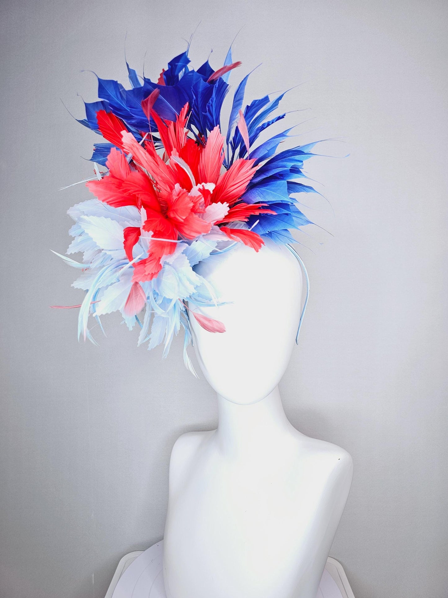 kentucky derby hat fascinator fluffy light blue zigzag feather flower and coral red royal cobalt blue baby blue branching feathers