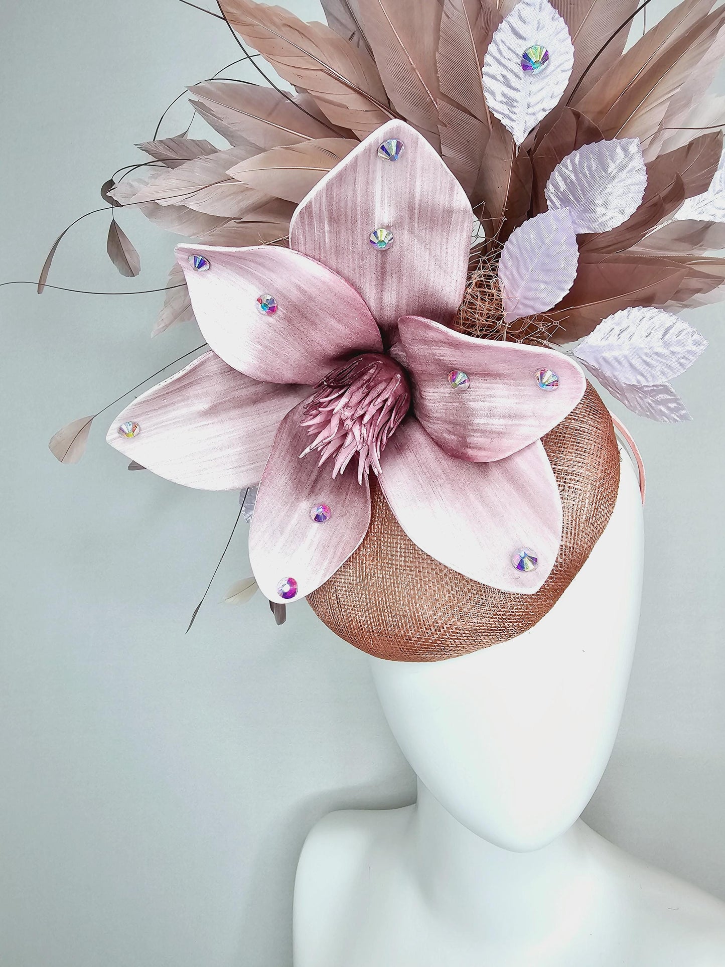 kentucky derby hat fascinator neutral dusty pink sinamay with light dusty pink satin flower white leaves taupe brown branching feathers