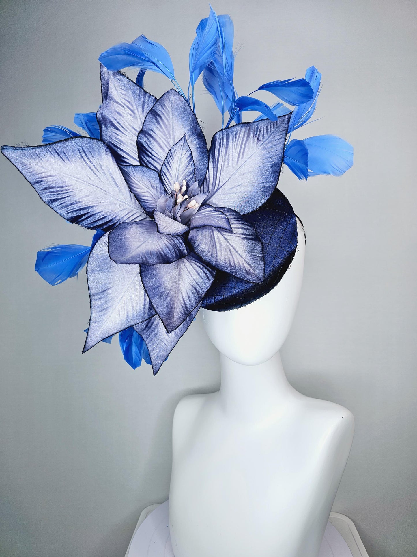 kentucky derby hat fascinator navy blue satin with netting and large ombre blue satin flower and royal blue sky blue branching feathers
