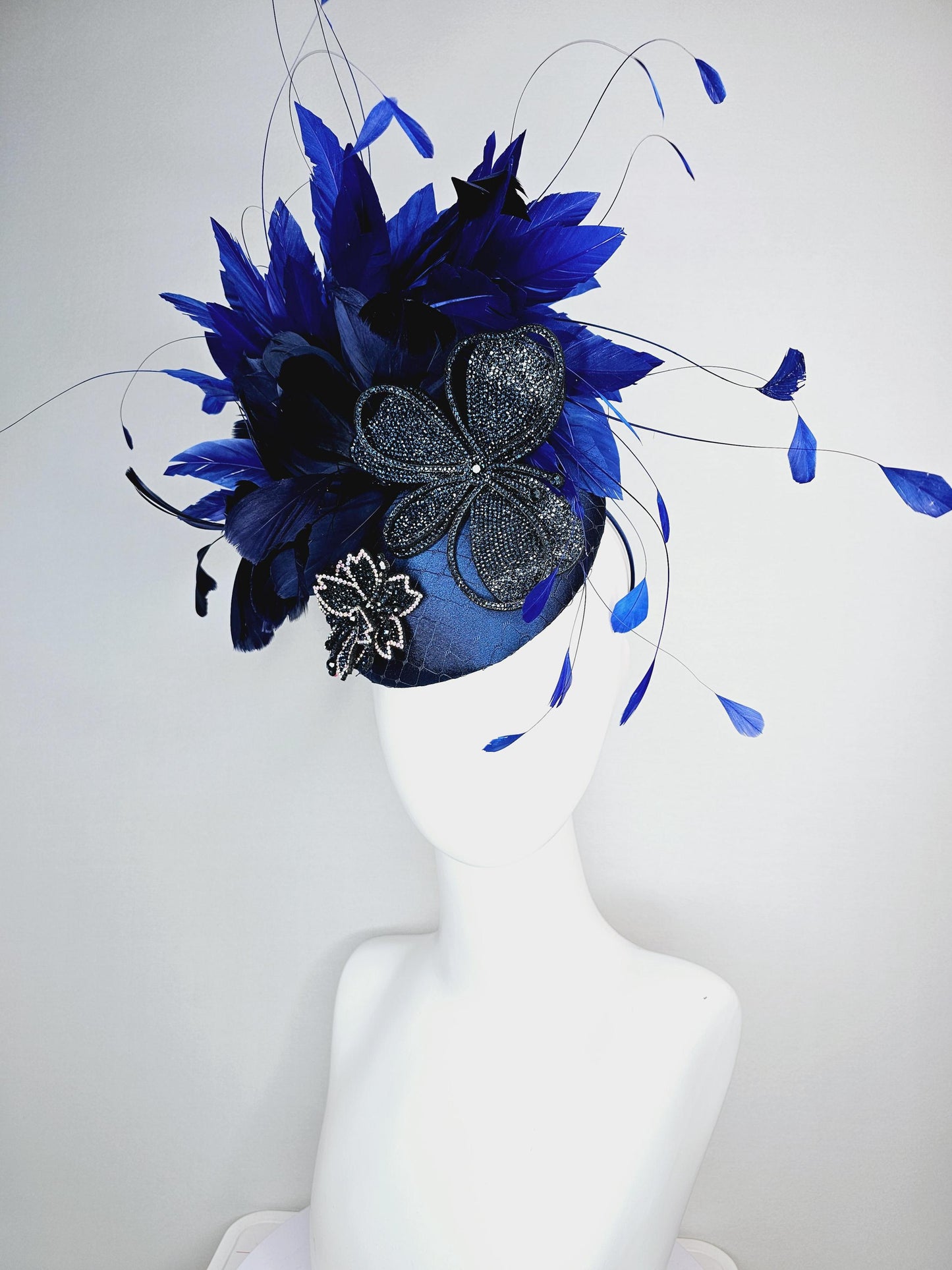 kentucky derby hat fascinator royal blue satin with netting navy blue crystal flowers embroidered navy and cobalt blue branching feathers