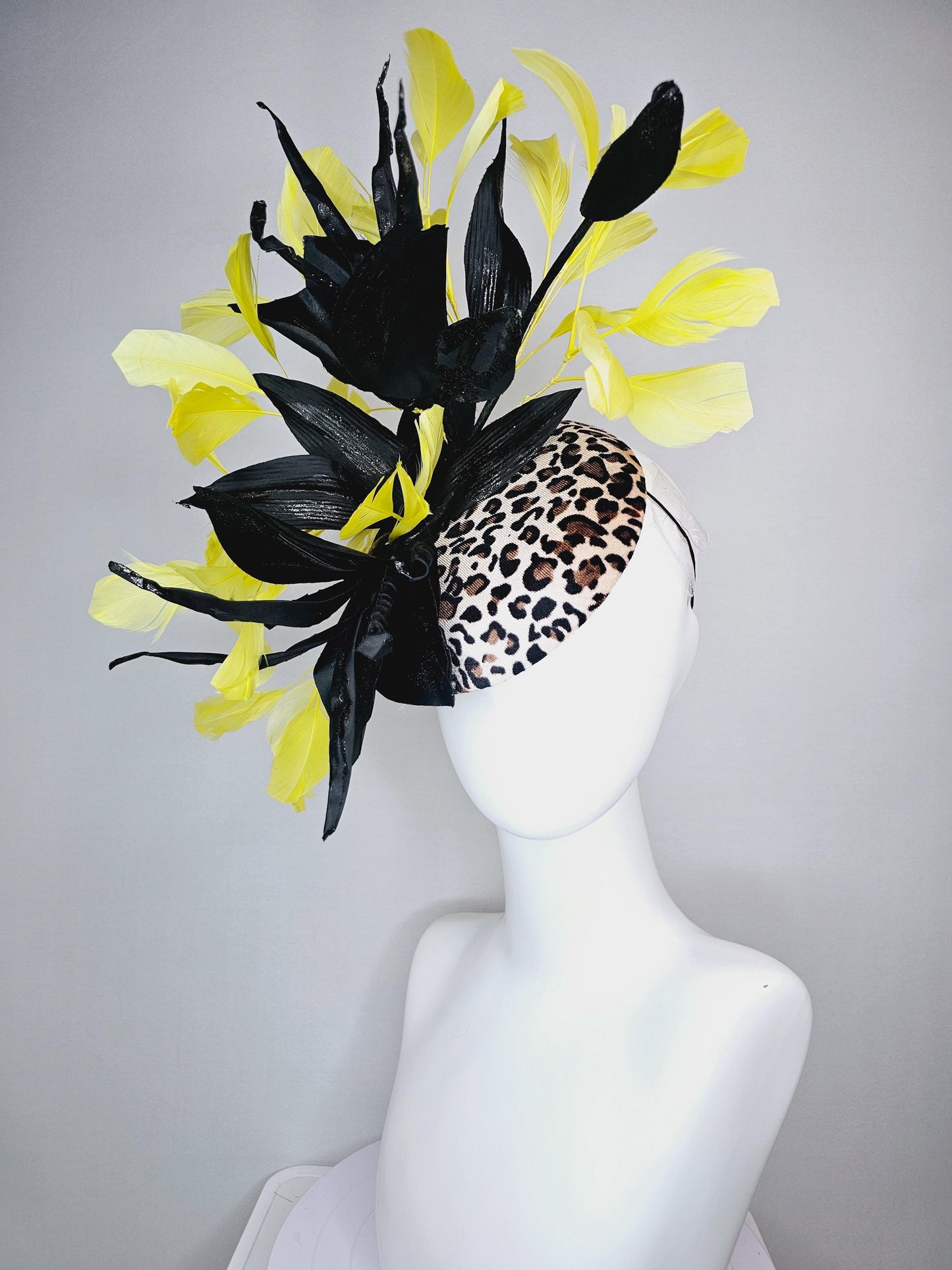 kentucky derby hat fascinator velvet leopard print with black satin flowers and satin black leaves with yellow branching feathers