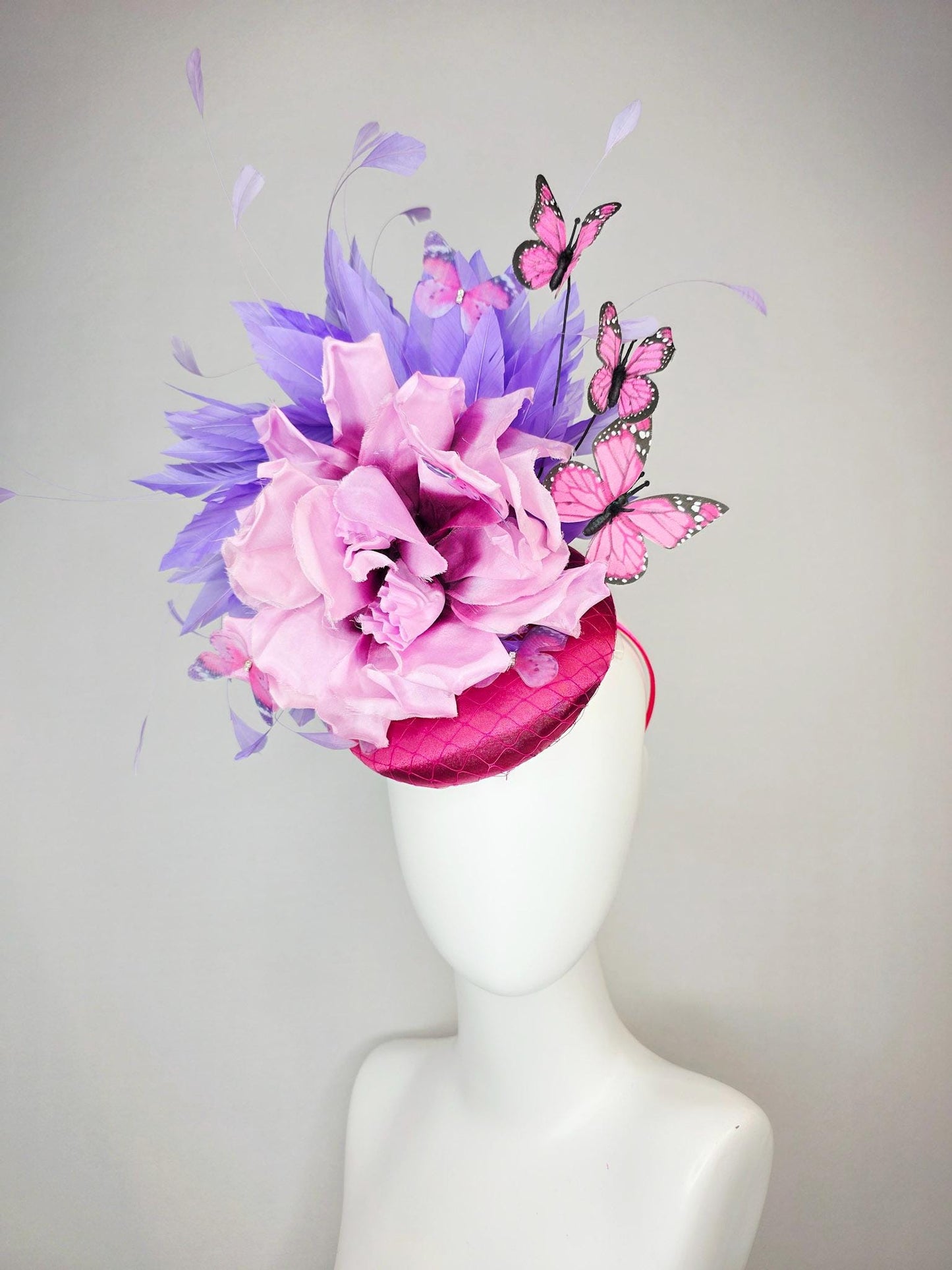 kentucky derby hat fascinator pink satin with netting large lilac purple satin flower lavender purple feathers and pink butterflies