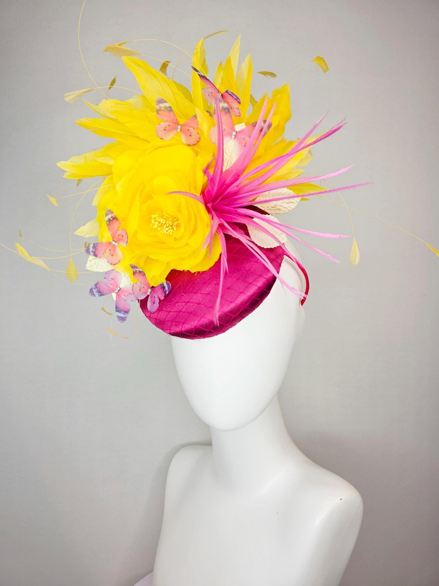 kentucky derby hat fascinator hot pink satin with netting yellow satin rose white leaves pink feather flower yellow feathers and butterflies