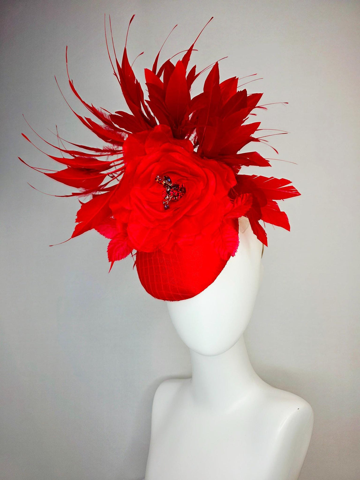 kentucky derby hat fascinator bright red satin with netting large red organza rose flower with red leaves and scarlet red branching feathers