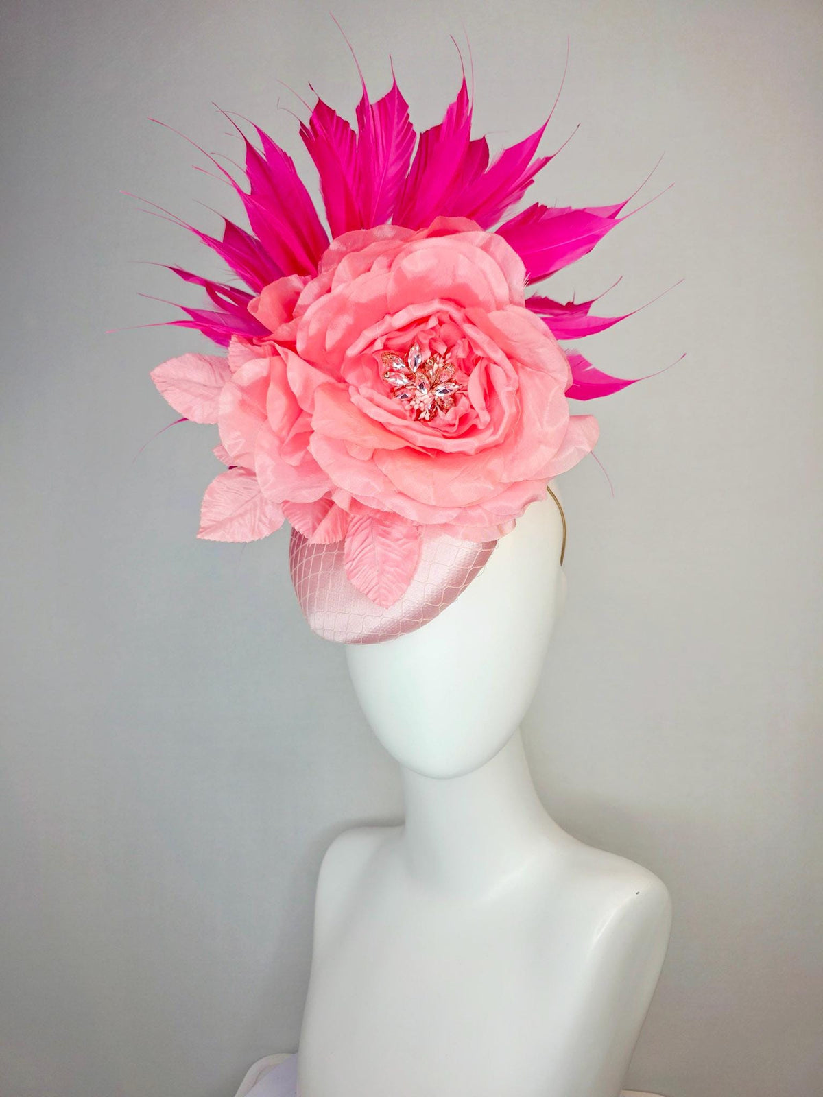 kentucky derby hat fascinator light pink satin with netting large baby pink satin rose light pink leaves and fuchsia pink branching feathers