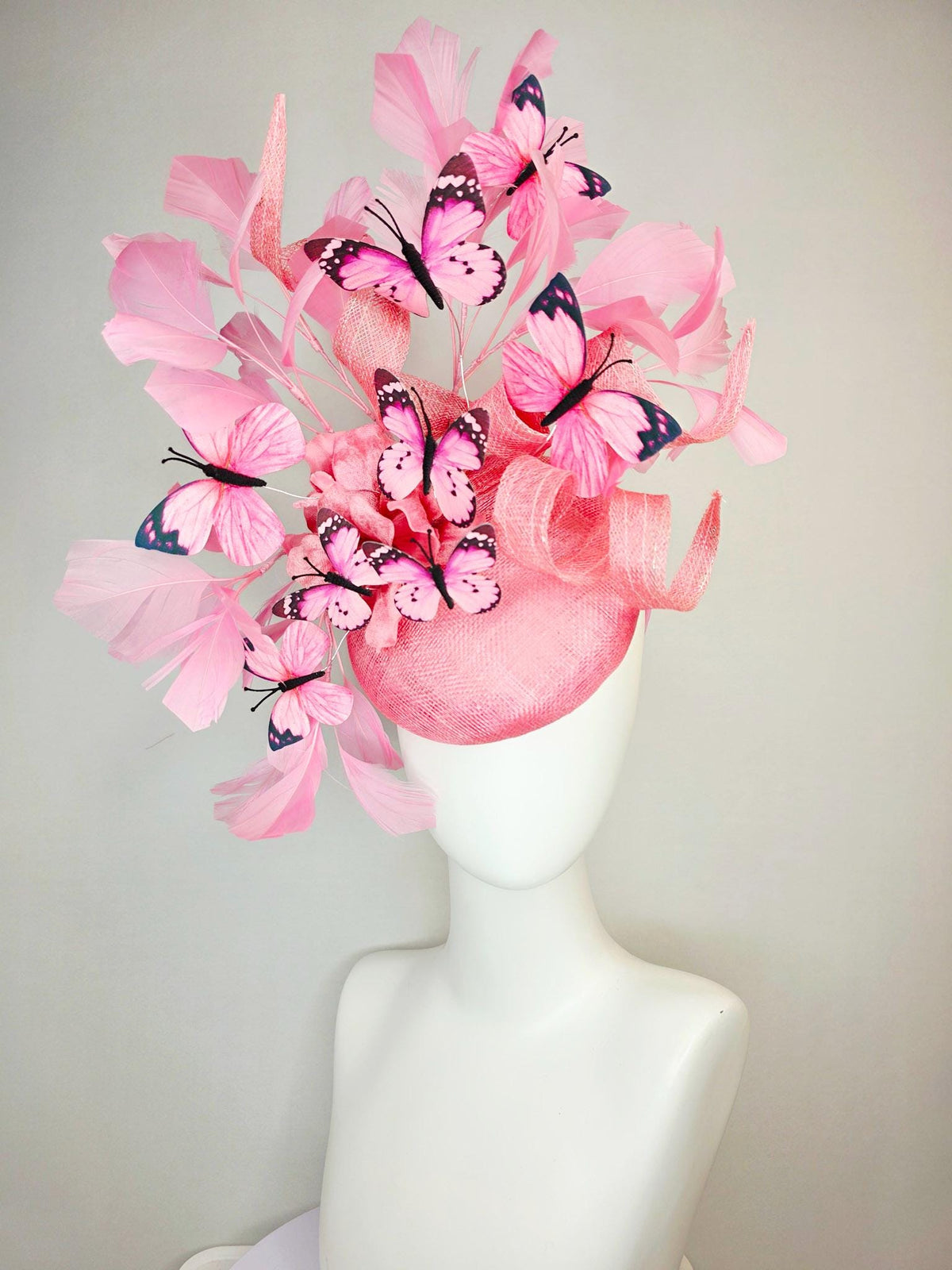 kentucky derby hat fascinator dusty pink sinamay with curls rose pink organza flower baby pink feathers light pink and black butterflies