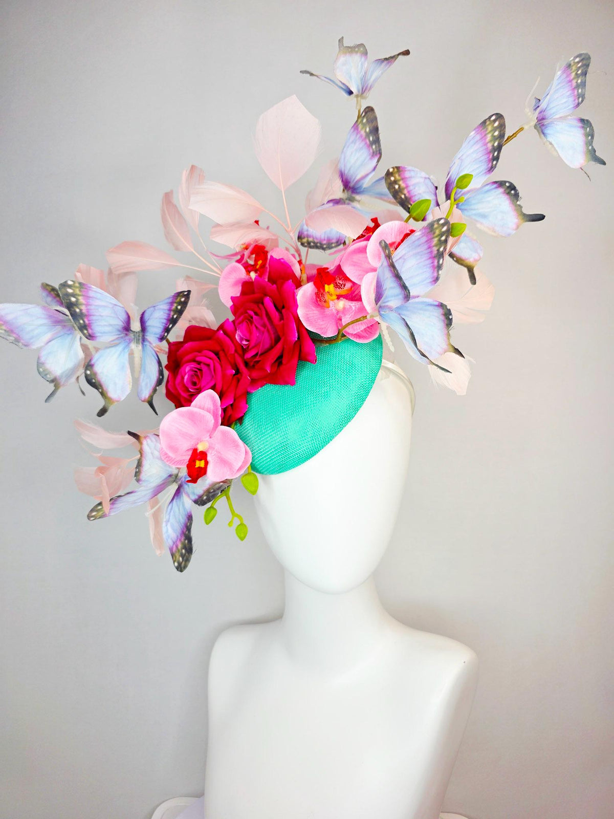 kentucky derby hat fascinator mint green sinamay red roses pink orchids pale light pink branching feathers black lavender purple butterflies