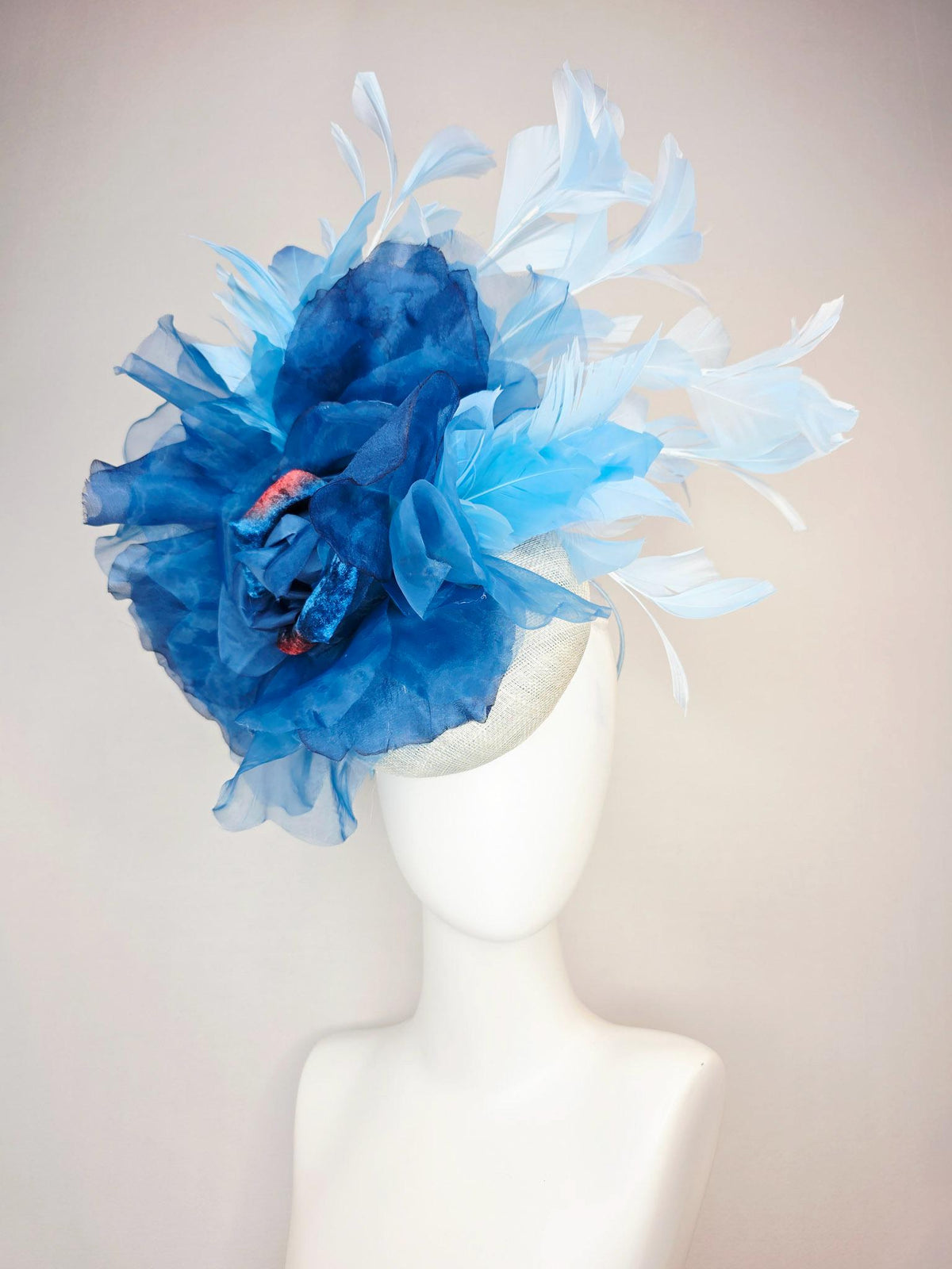 kentucky derby hat fascinator ivory white sinamay with large cobalt royal blue organza flower and light baby sky blue branching feathers
