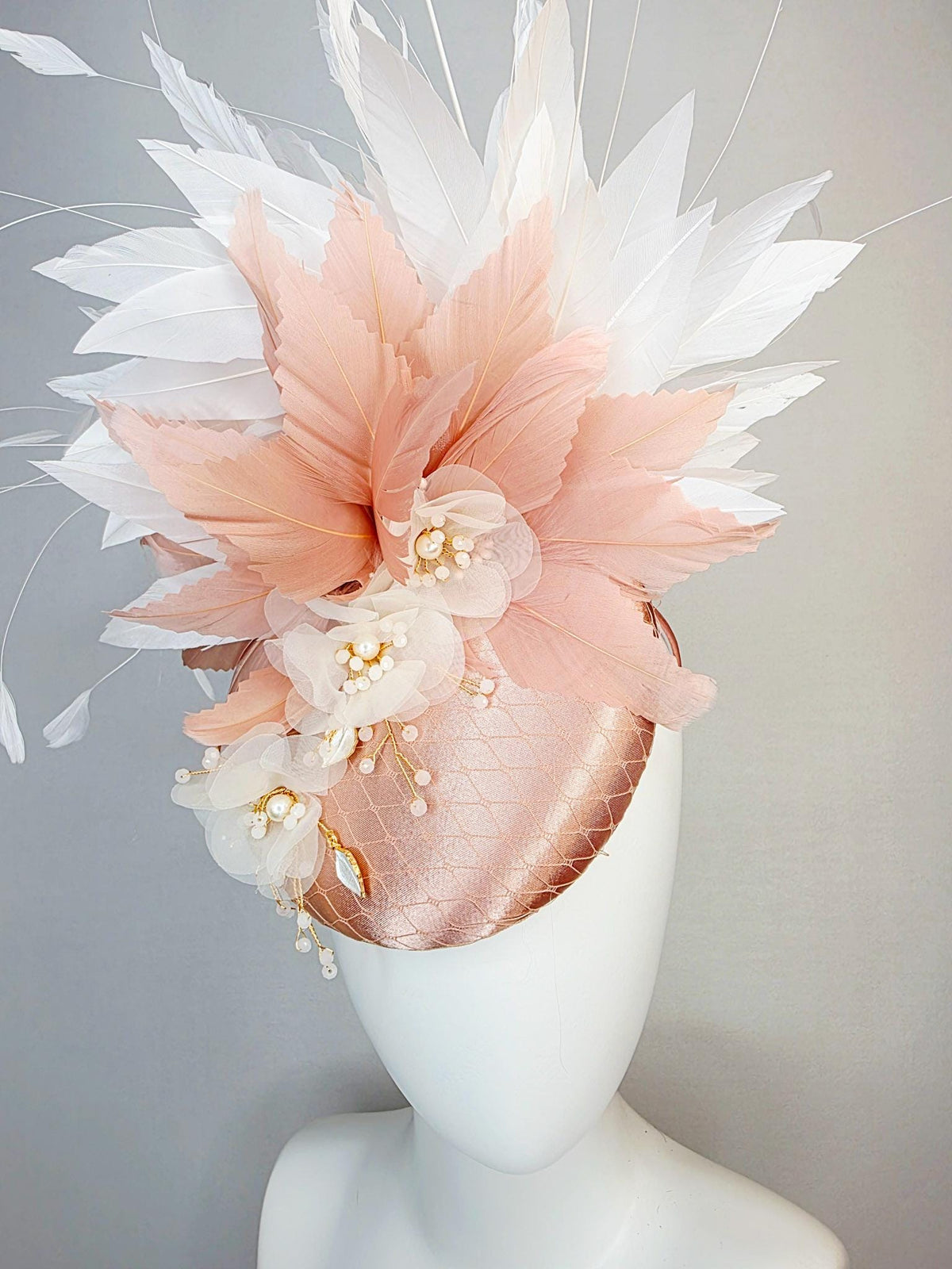 kentucky derby hat fascinator champagne pink satin with netting white organza flowers pearl strings dusty pink and white branching feathers