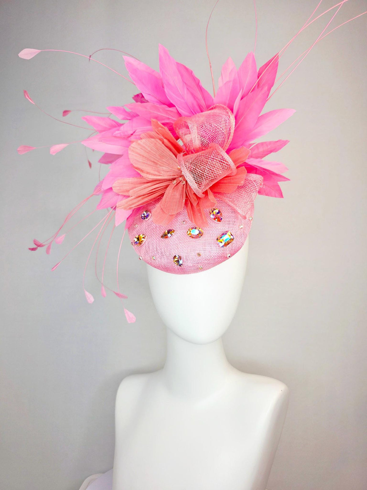 kentucky derby hat fascinator light pink sinamay iridescent pink crystal rhinestone jewels light pink bow peach orange blush pink feathers