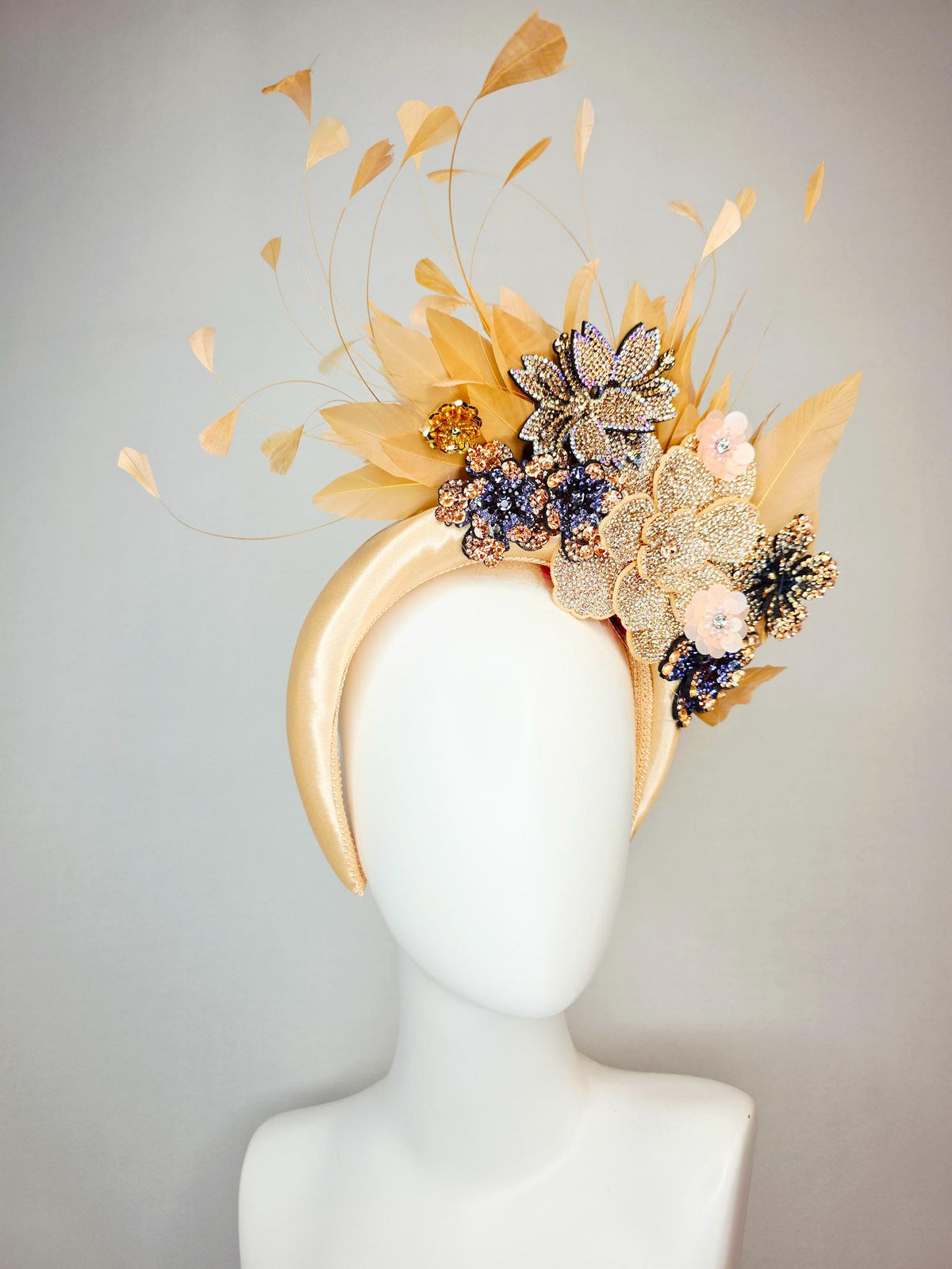 kentucky derby hat fascinator champagne gold satin headband with navy blue gold ivory crystal rhinestone flowers and tan beige gold feathers