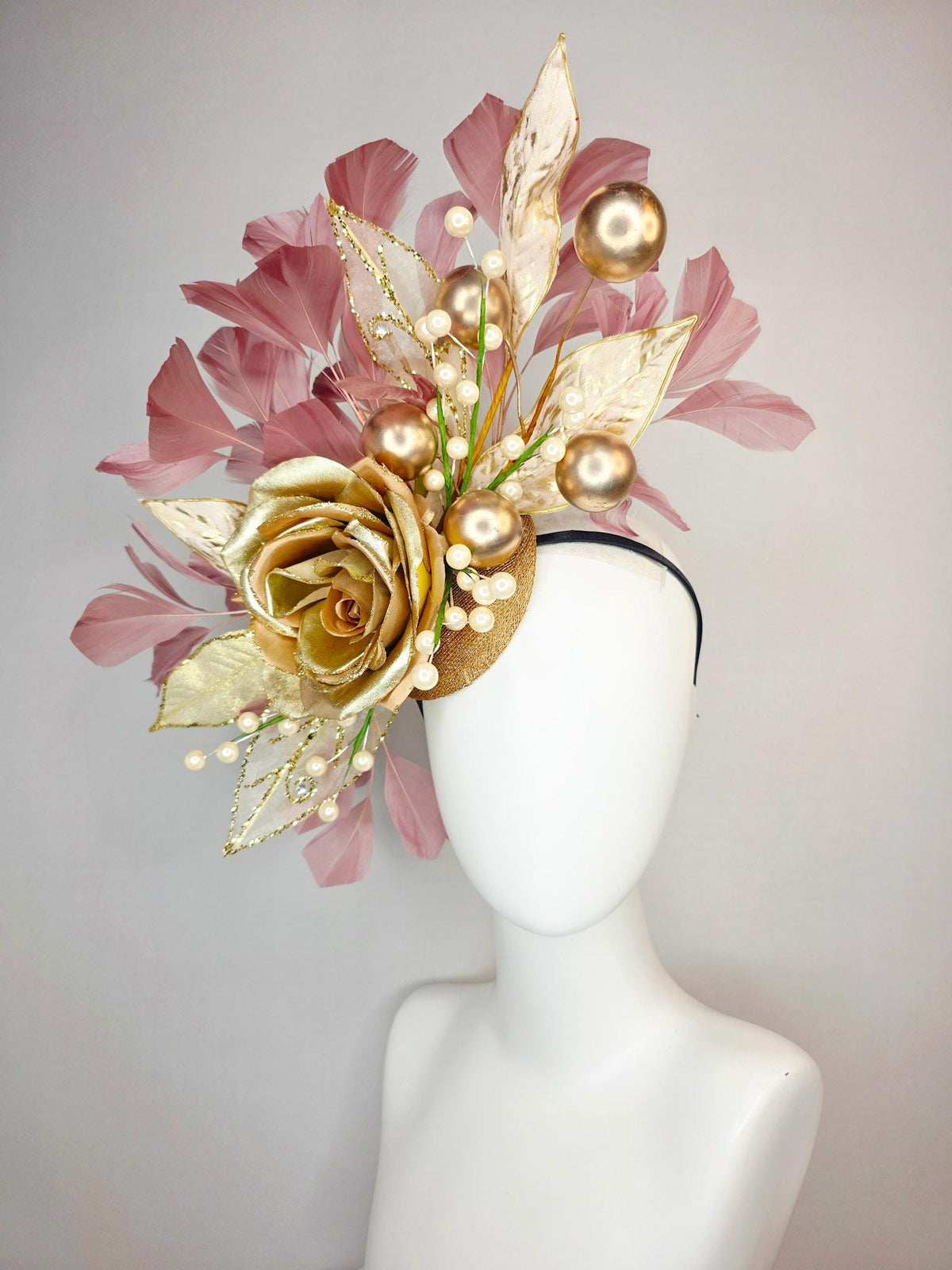 kentucky derby hat fascinator large gold satin silk rose with gold leaves large gold and small pearls mauve dusty pink branching feathers
