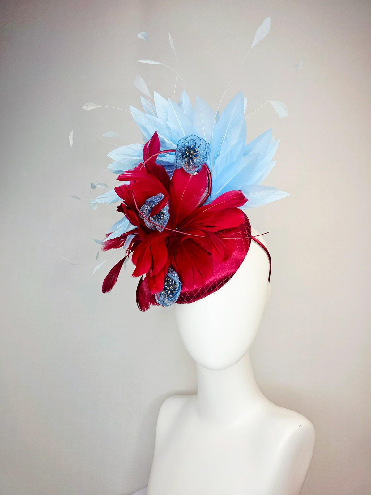 kentucky derby hat fascinator wine red satin with netting scarlet red sky blue branching feathers blue organza flowers rhinestone center