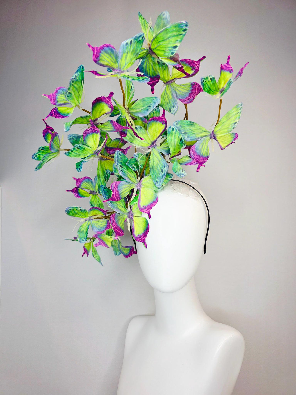 kentucky derby hat fascinator large branching colorful magenta pink purple lime green yellow blue fabric butterflies on headband