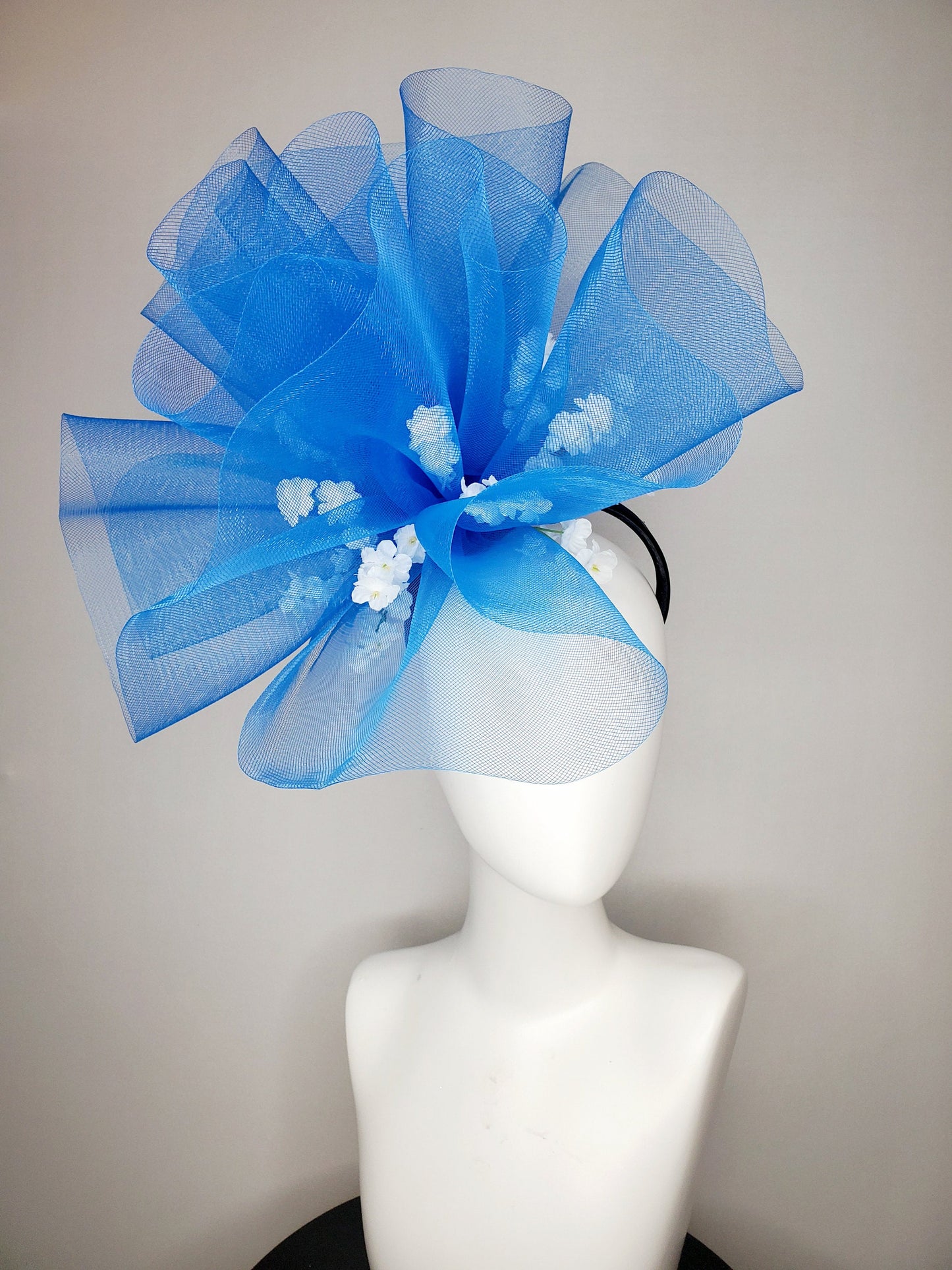 kentucky derby hat fascinator royal blue crinoline pouf with white flowers and black headband