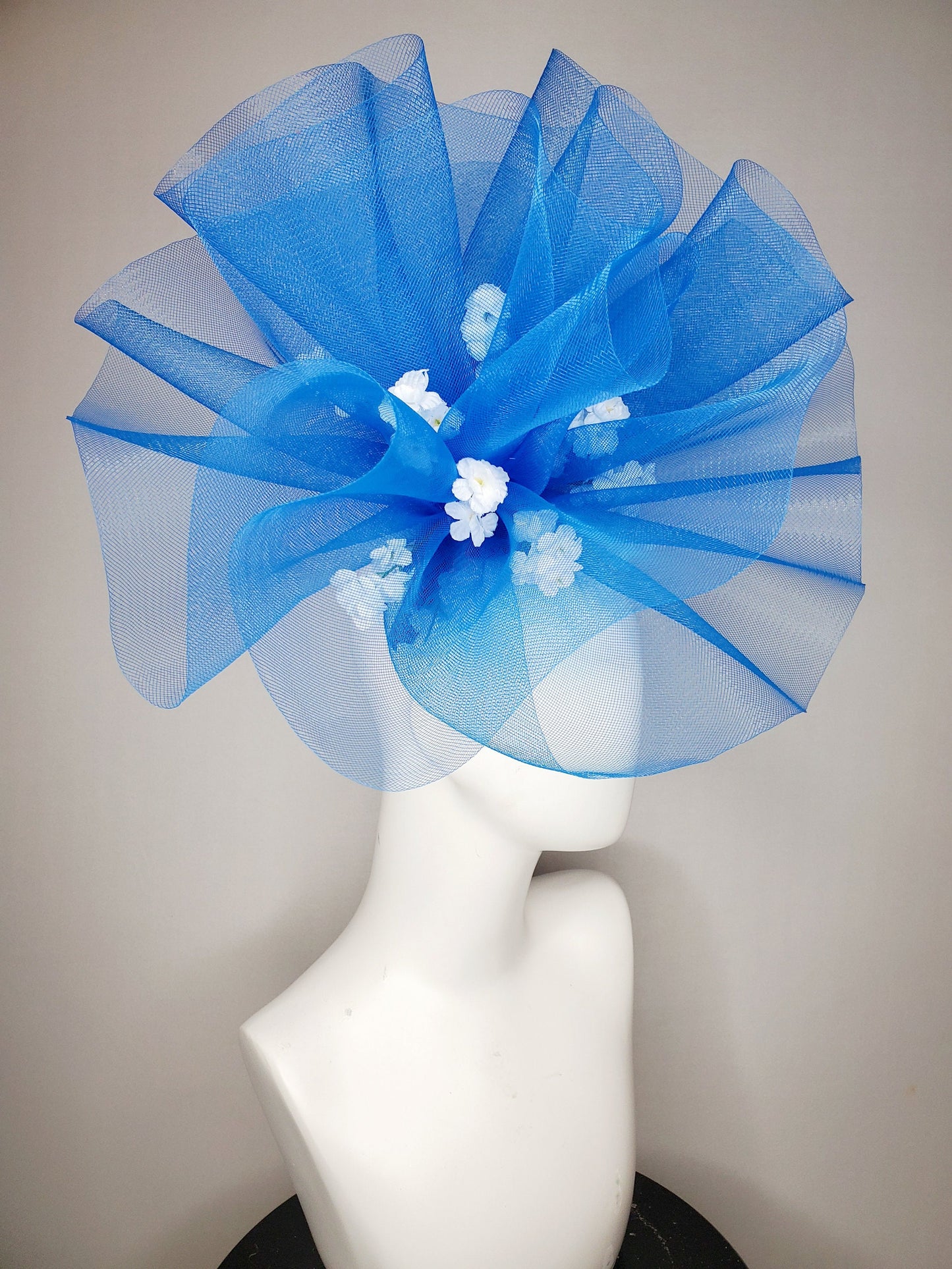 kentucky derby hat fascinator royal blue crinoline pouf with white flowers and black headband