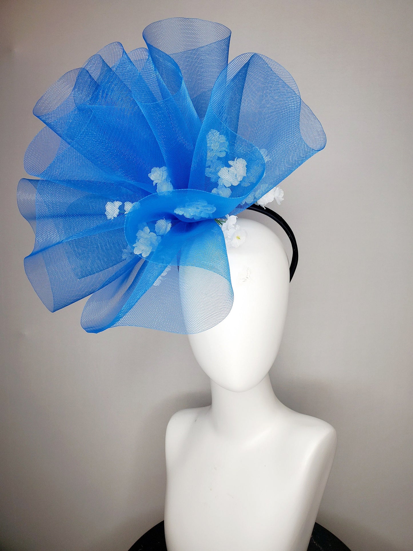 kentucky derby hat fascinator royal blue crinoline pouf with white flowers and black headband