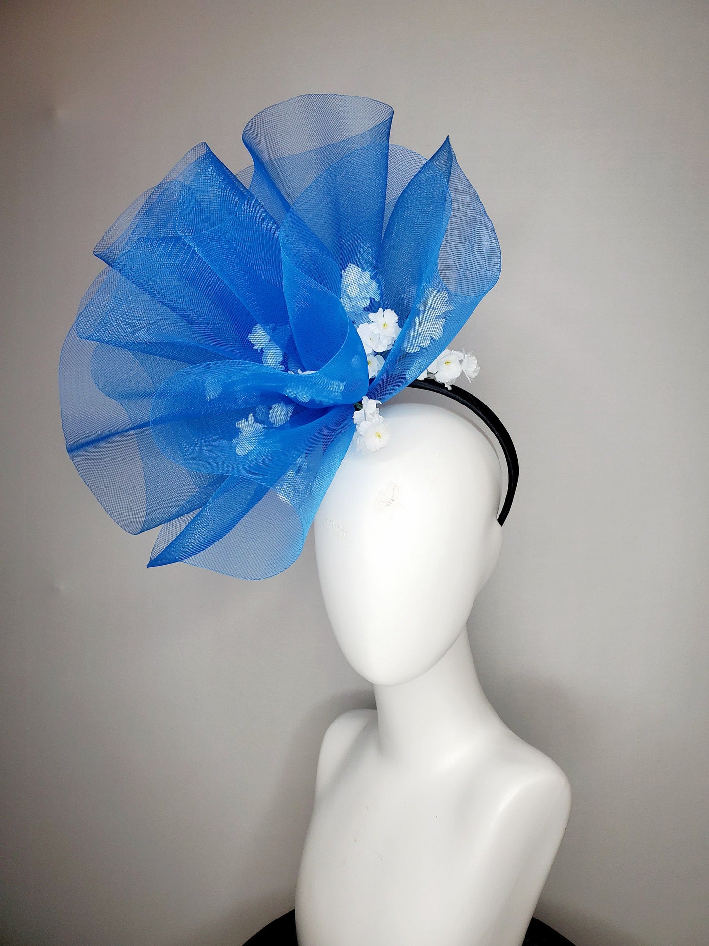 kentucky derby hat fascinator royal blue crinoline pouf with white flowers and black headband