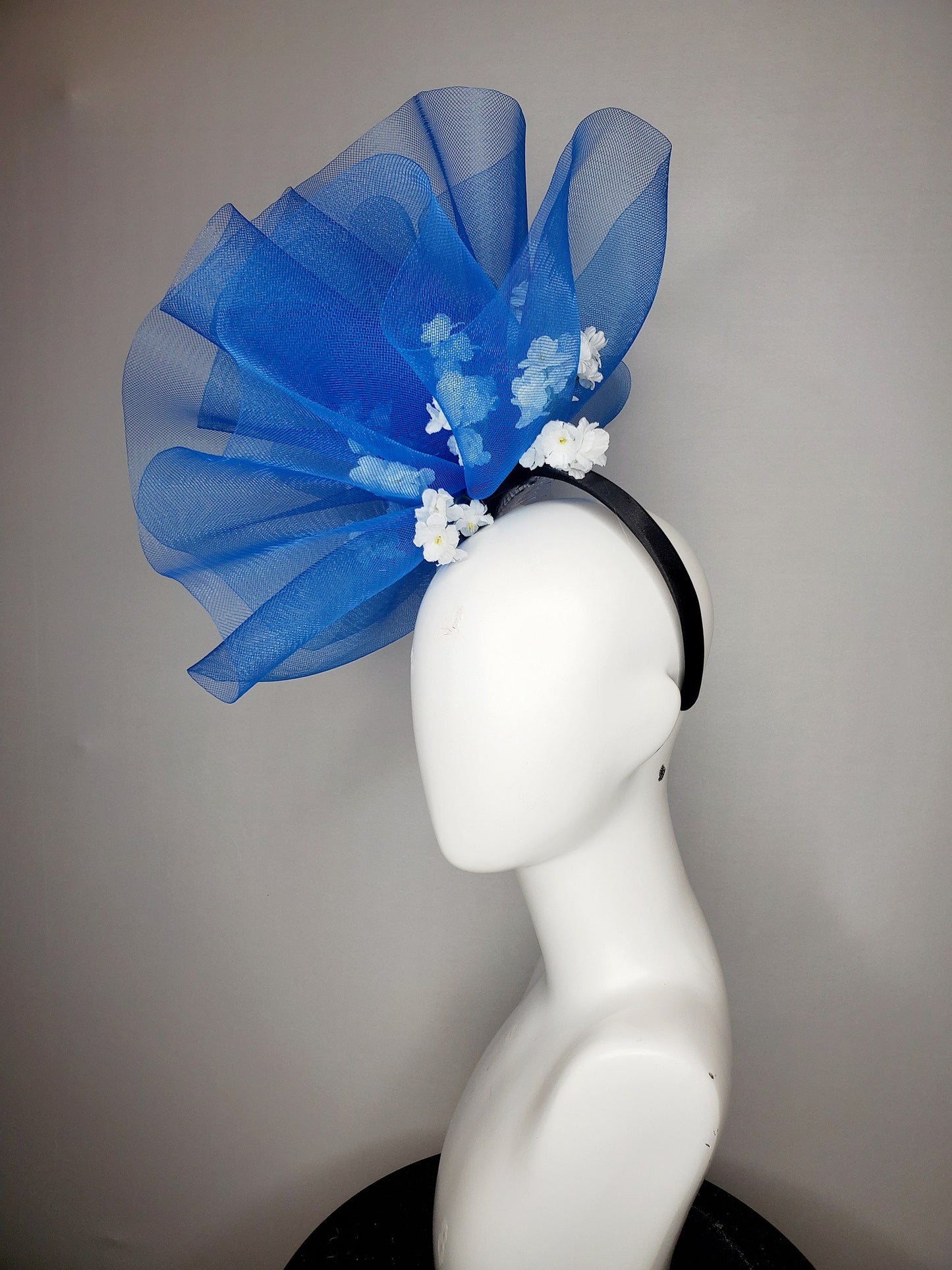 kentucky derby hat fascinator royal blue crinoline pouf with white flowers and black headband