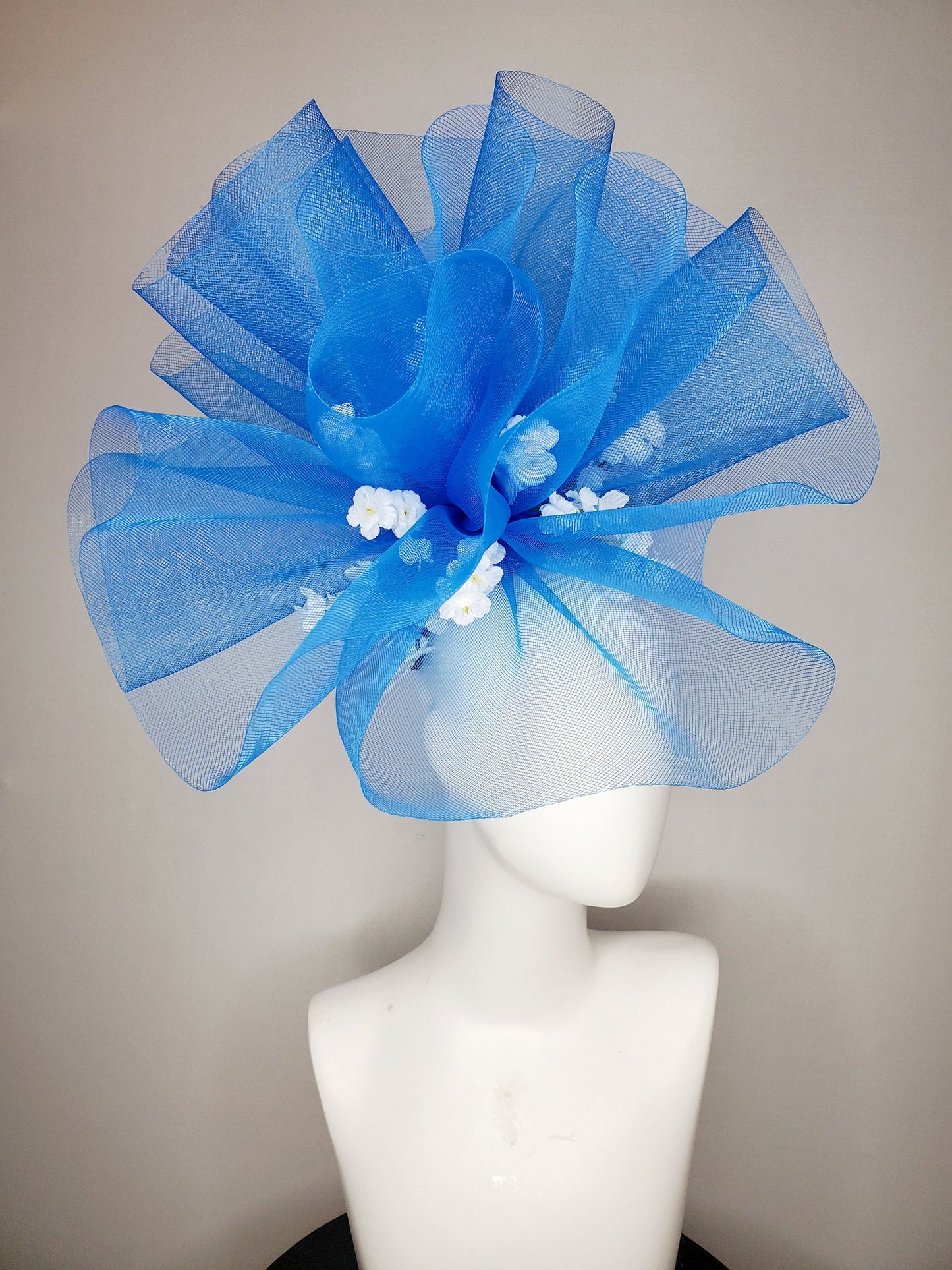 kentucky derby hat fascinator royal blue crinoline pouf with white flowers and black headband