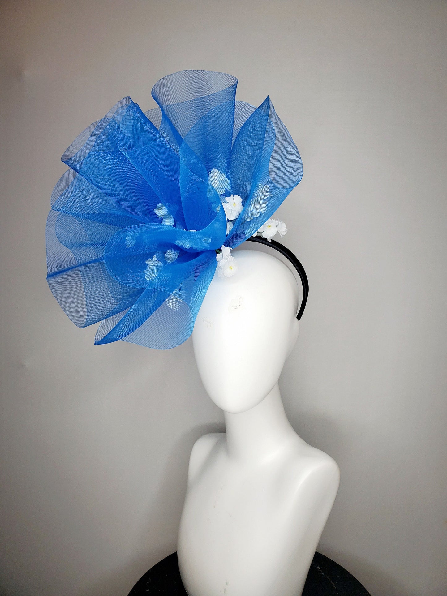 kentucky derby hat fascinator royal blue crinoline pouf with white flowers and black headband