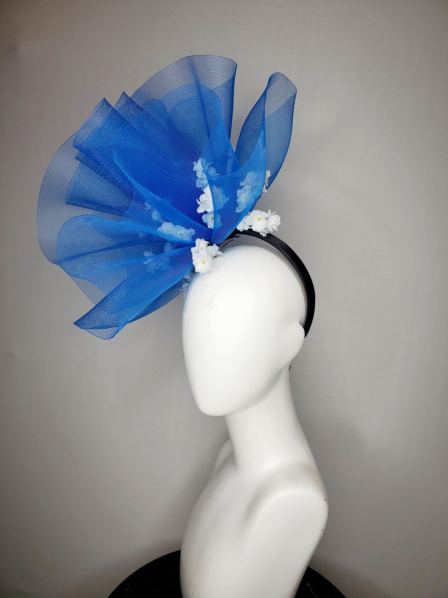 kentucky derby hat fascinator royal blue crinoline pouf with white flowers and black headband