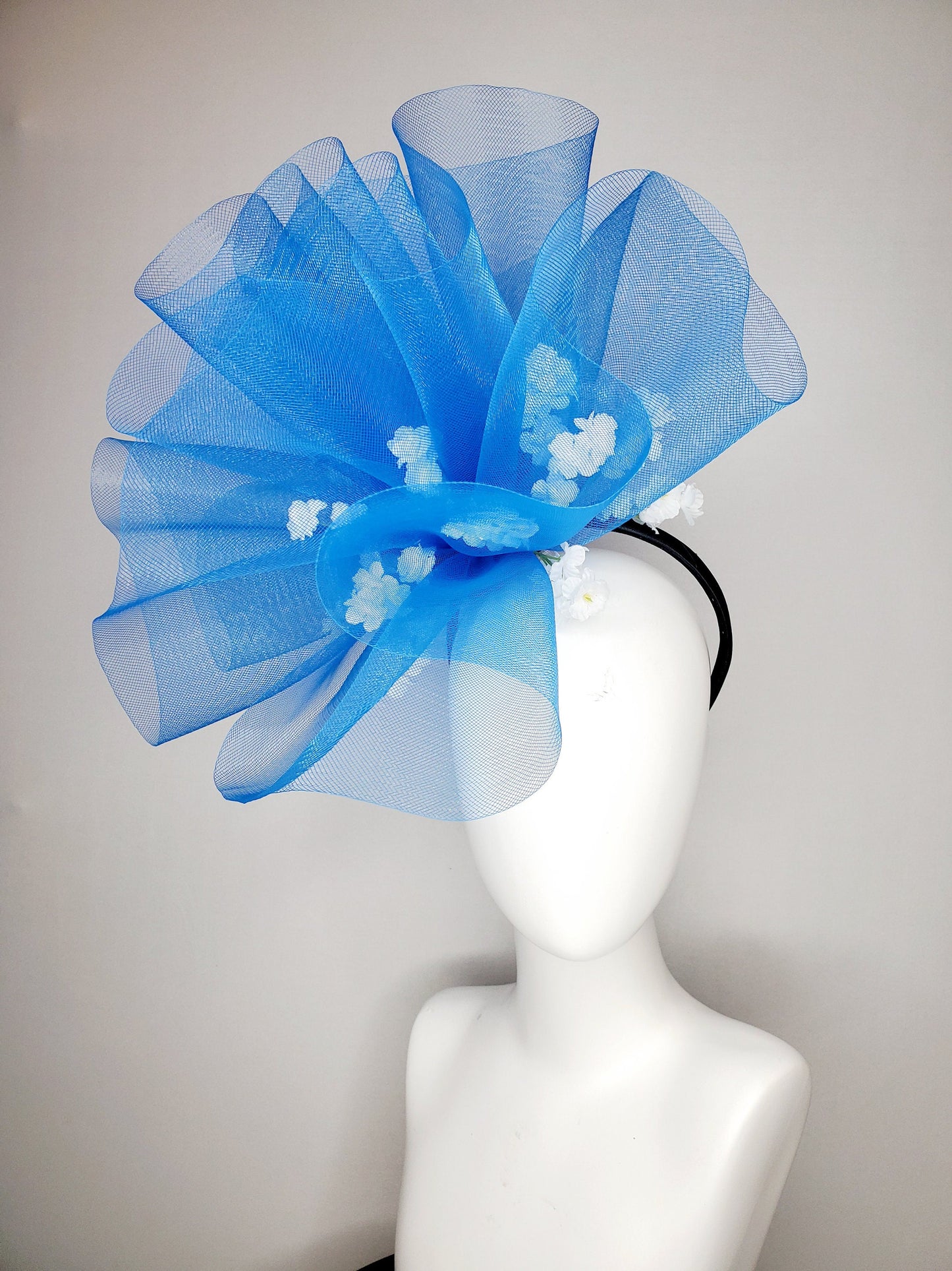 kentucky derby hat fascinator royal blue crinoline pouf with white flowers and black headband