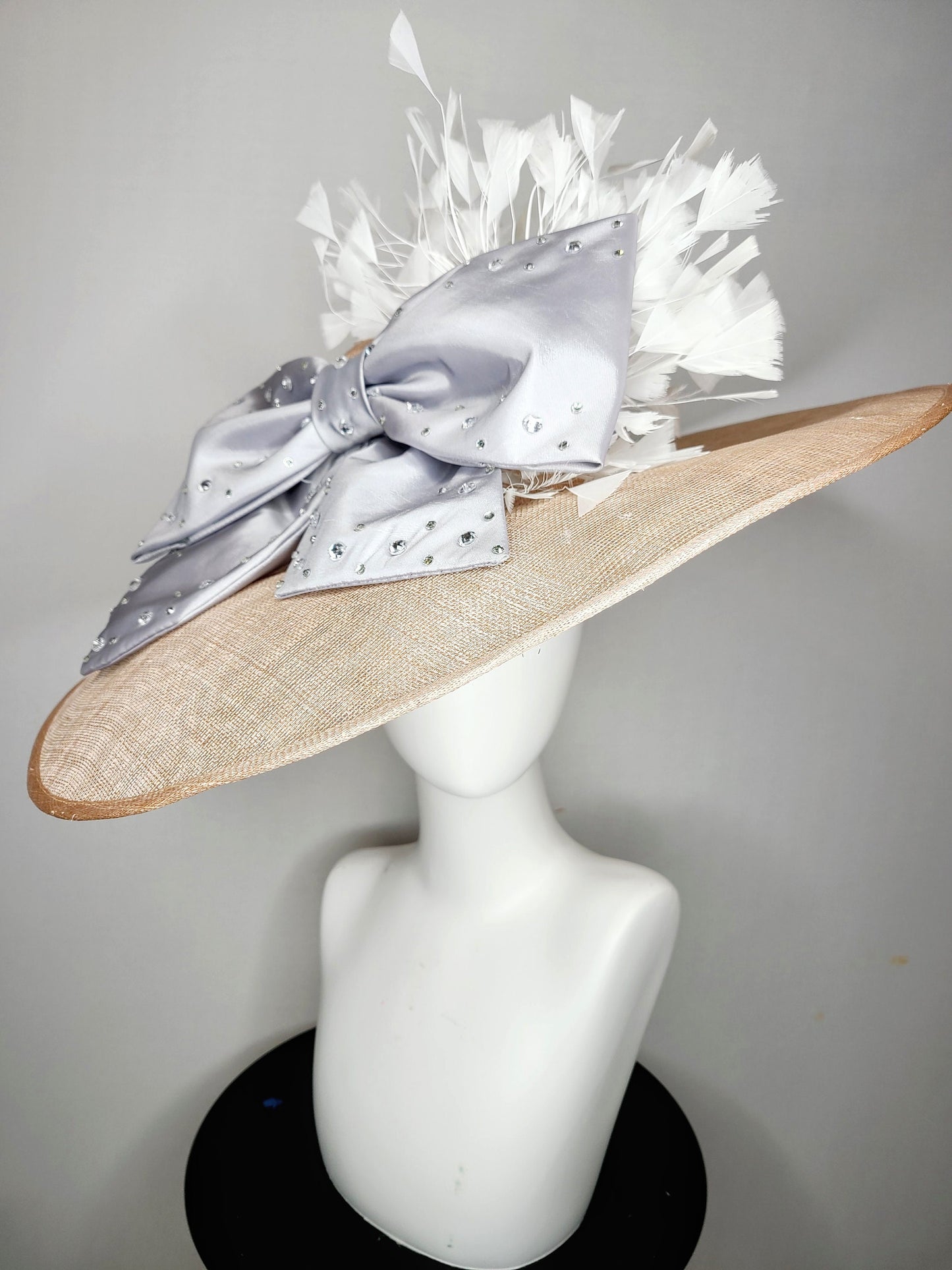 kentucky derby hat wide brim beige taupe sinamay with large satin taffeta silver gray crystal bow with white feathers