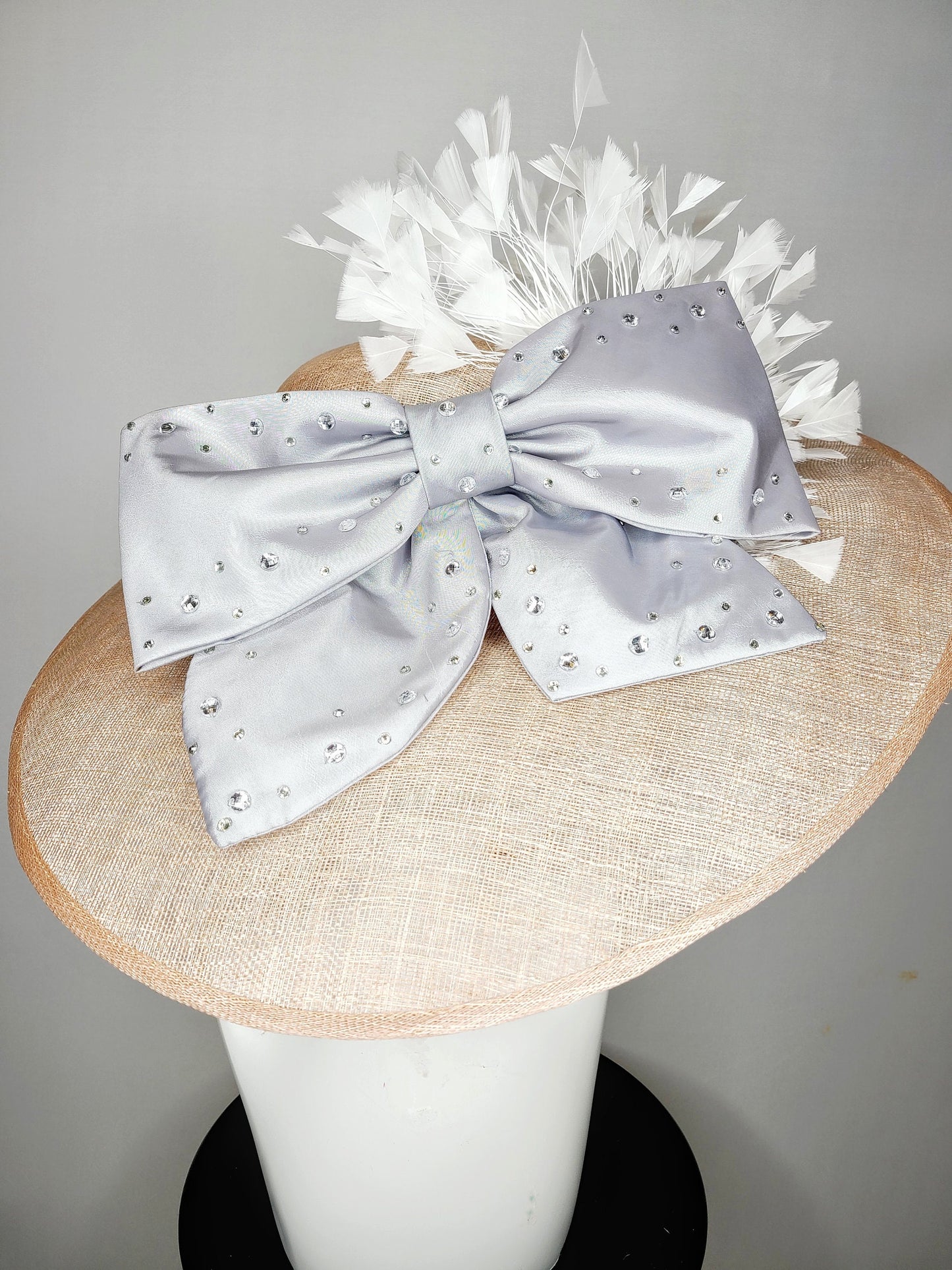 kentucky derby hat wide brim beige taupe sinamay with large satin taffeta silver gray crystal bow with white feathers