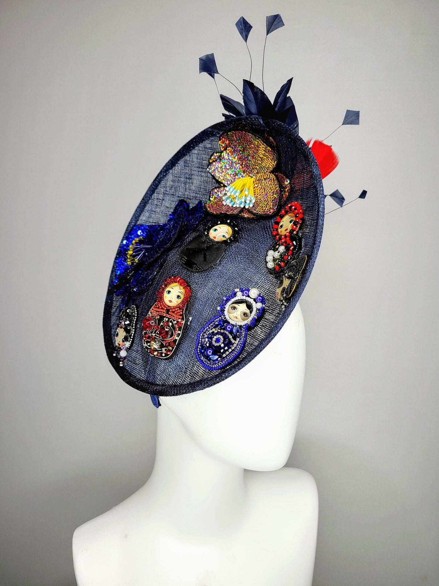 kentucky derby hat fascinator navy blue sinamay saucer gold crystal rhinestone jewel colorful russian dolls matroyshka with blue red feather