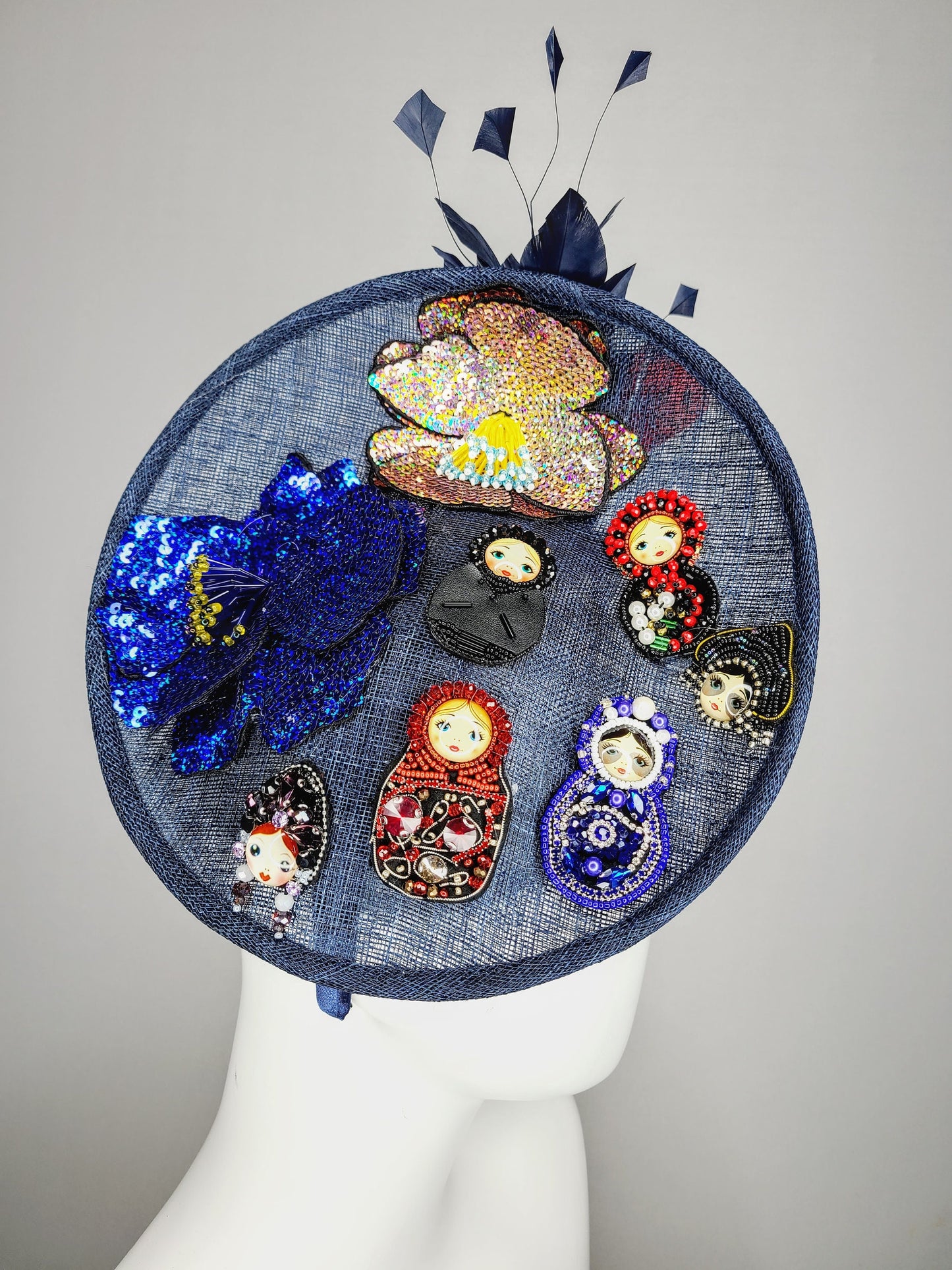 kentucky derby hat fascinator navy blue sinamay saucer gold crystal rhinestone jewel colorful russian dolls matroyshka with blue red feather