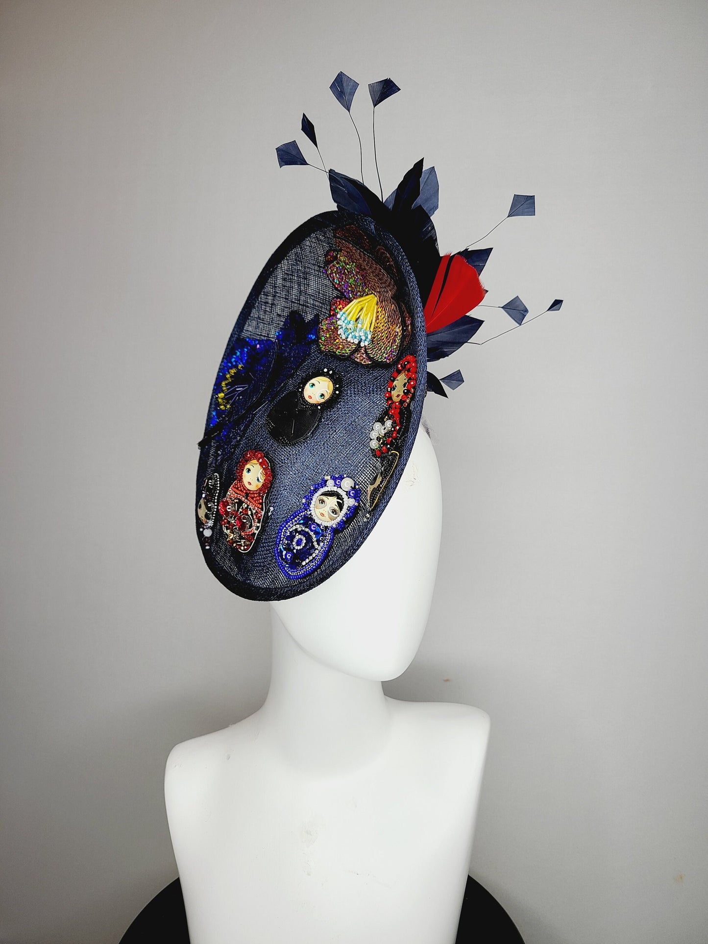 kentucky derby hat fascinator navy blue sinamay saucer gold crystal rhinestone jewel colorful russian dolls matroyshka with blue red feather