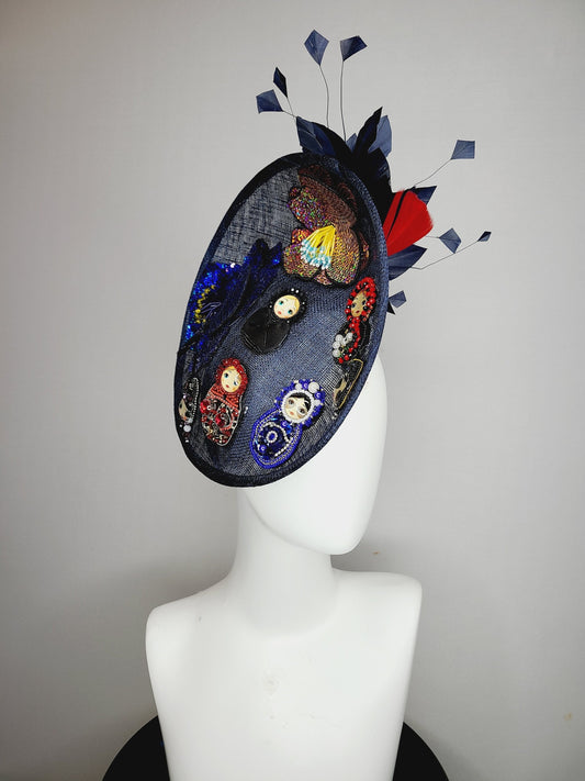 kentucky derby hat fascinator navy blue sinamay saucer gold crystal rhinestone jewel colorful russian dolls matroyshka with blue red feather