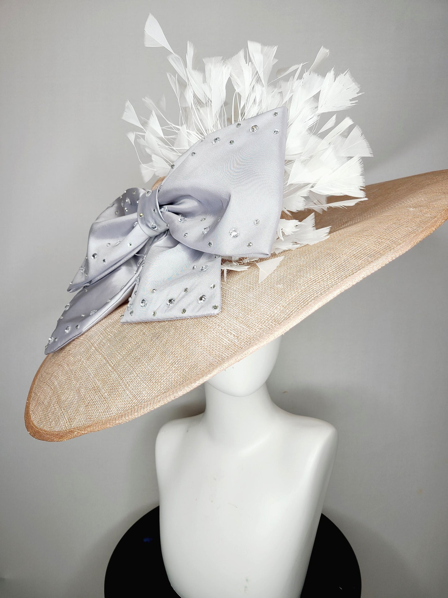 kentucky derby hat wide brim beige taupe sinamay with large satin taffeta silver gray crystal bow with white feathers