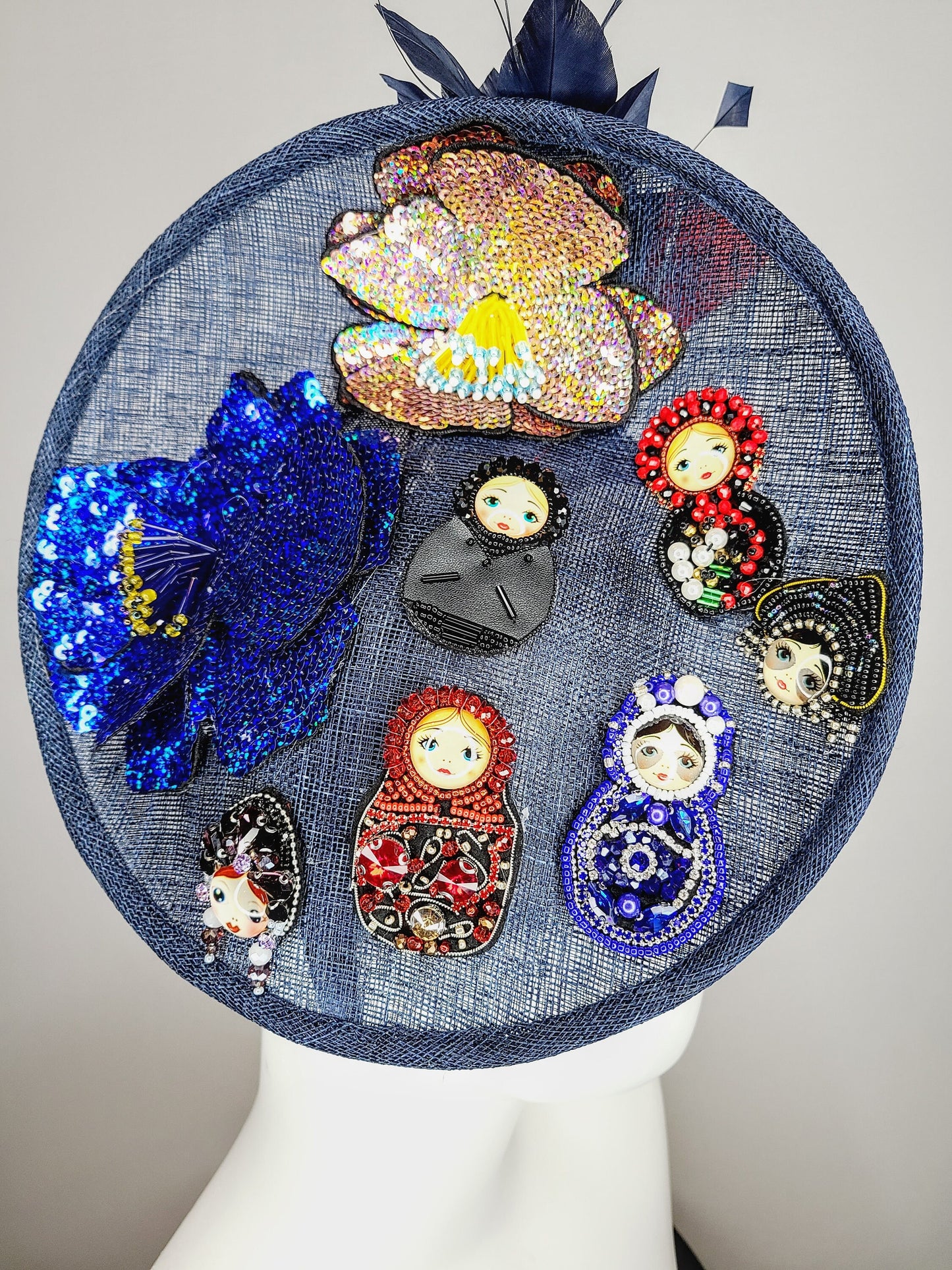 kentucky derby hat fascinator navy blue sinamay saucer gold crystal rhinestone jewel colorful russian dolls matroyshka with blue red feather