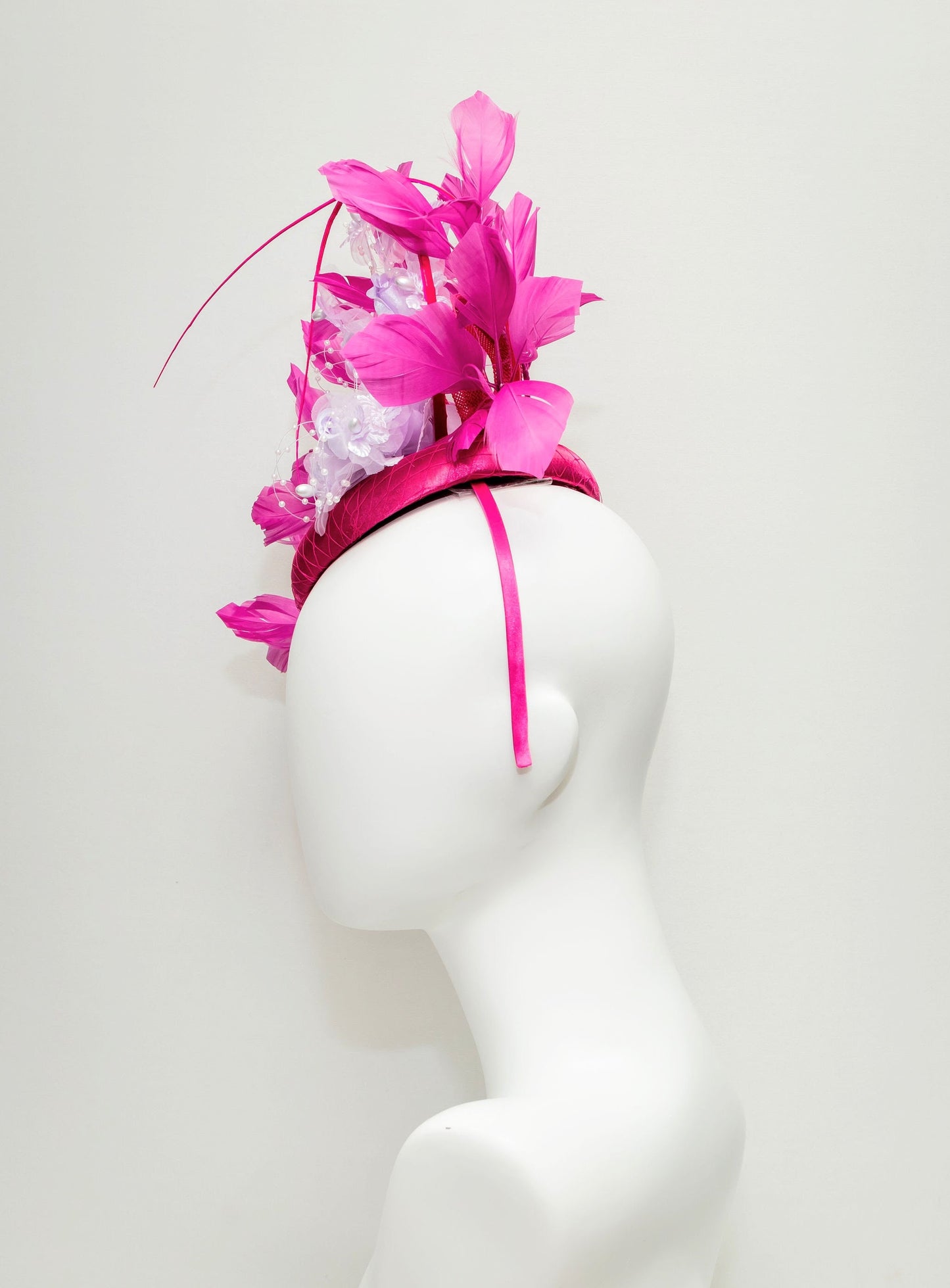 kentucky derby hat fascinator magenta fuchsia hot pink satin with bright pink feathers lavender light purple satin flowers pearls leaves