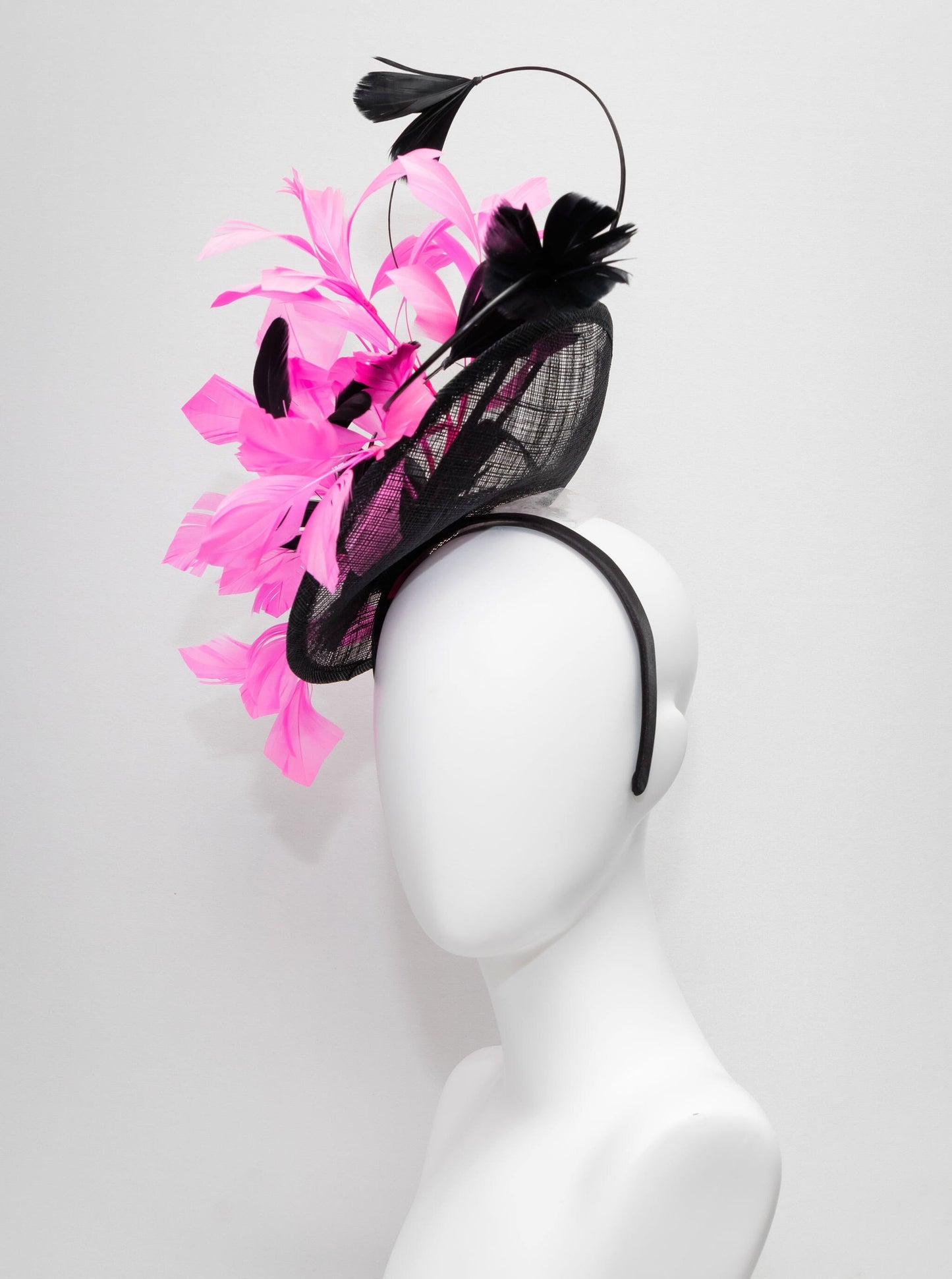 kentucky derby hat fascinator black sinamay with branching  black feather flowers with bright pink feathers