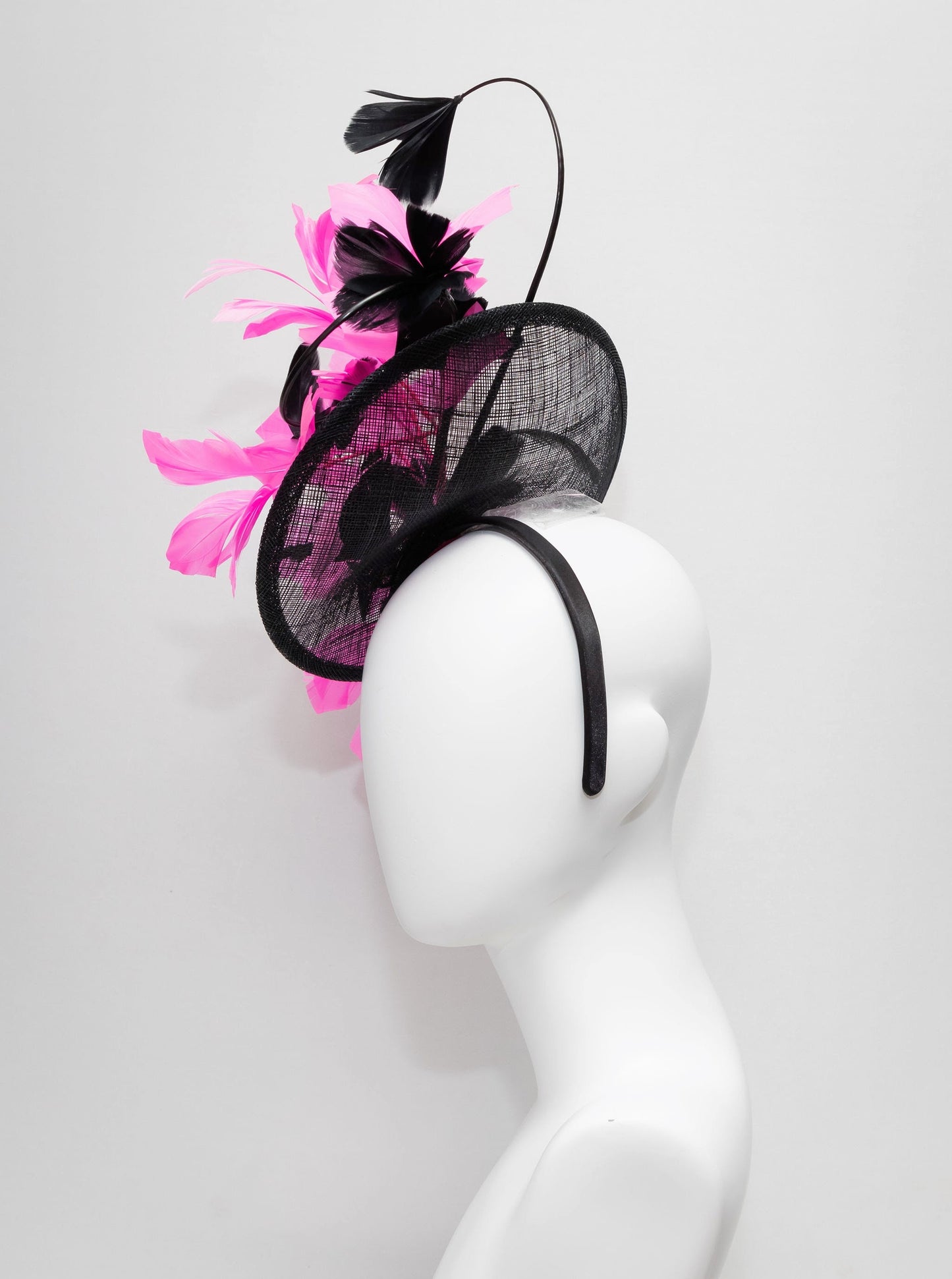 kentucky derby hat fascinator black sinamay with branching  black feather flowers with bright pink feathers