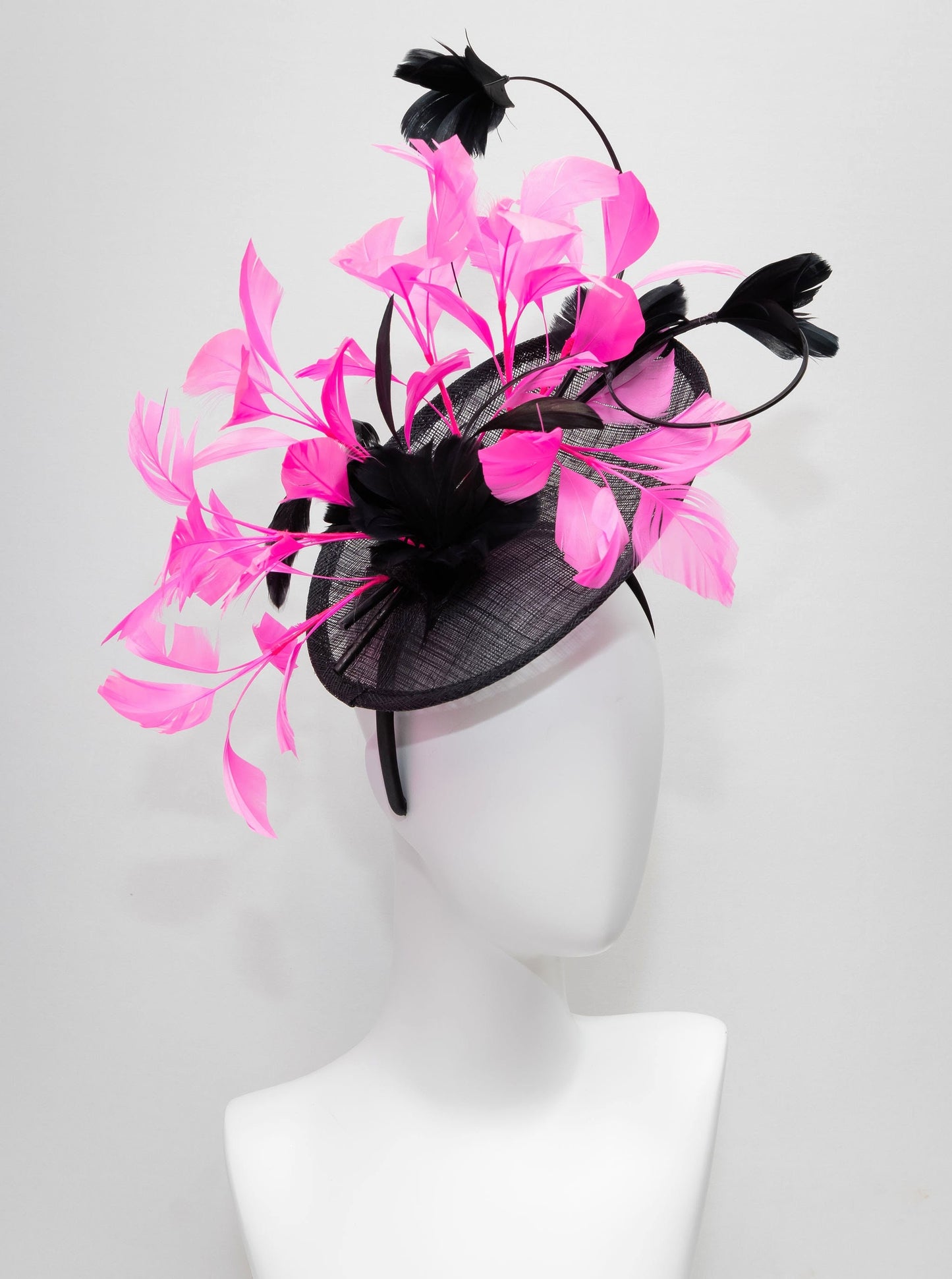 kentucky derby hat fascinator black sinamay with branching  black feather flowers with bright pink feathers