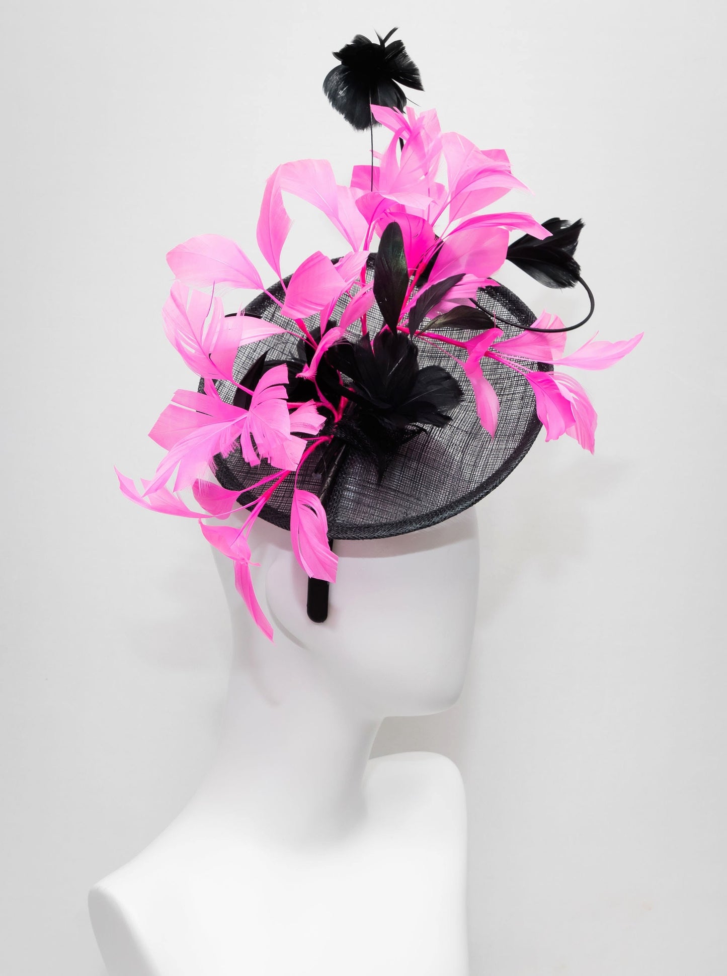 kentucky derby hat fascinator black sinamay with branching  black feather flowers with bright pink feathers