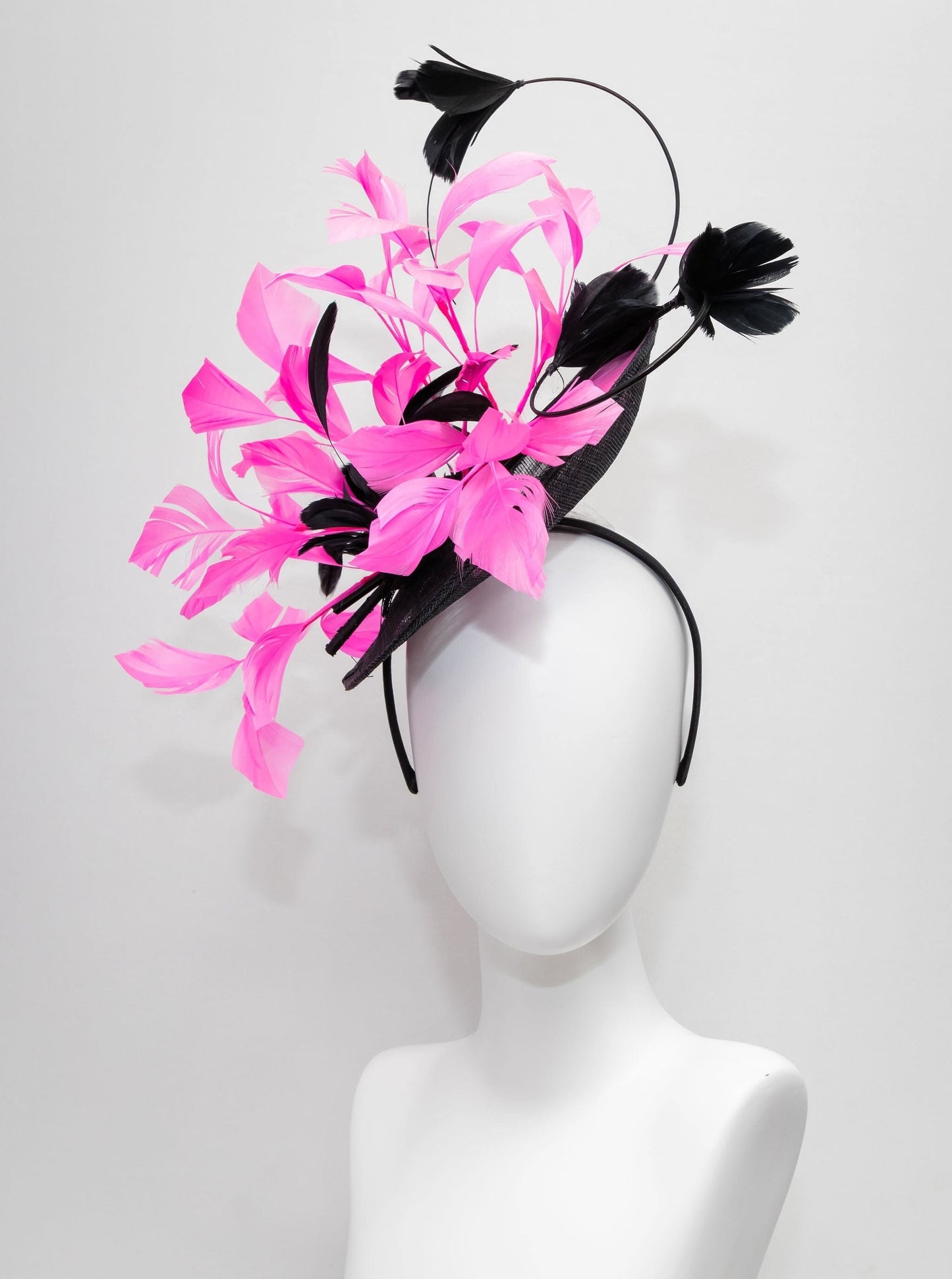 kentucky derby hat fascinator black sinamay with branching  black feather flowers with bright pink feathers