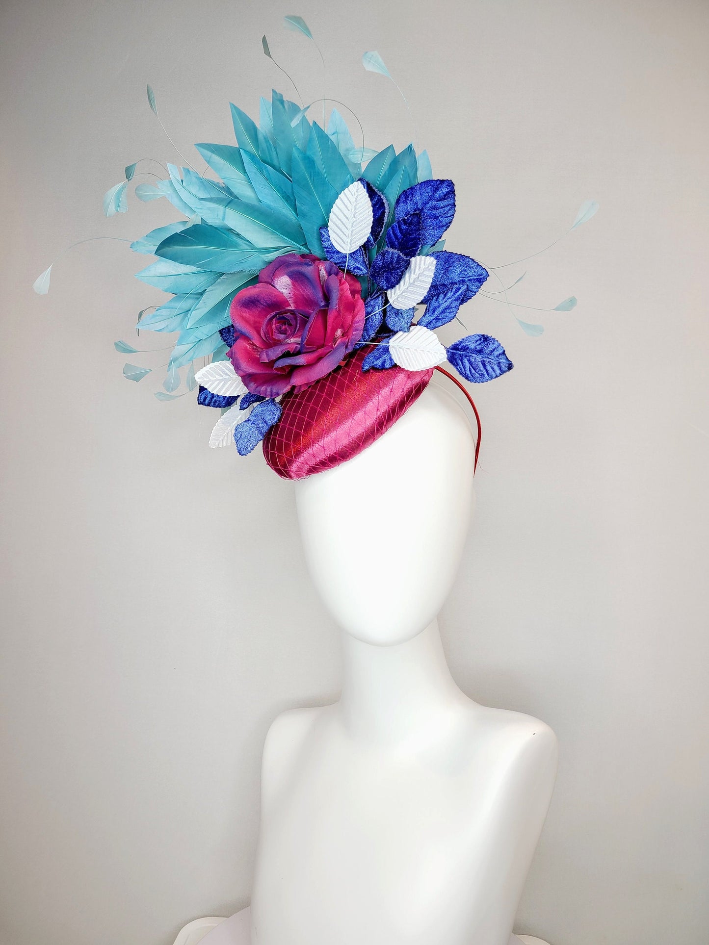 kentucky derby hat fascinator fuchsia magenta satin with painted magenta blue rose with teal blue feathers light blue royal blue leaves