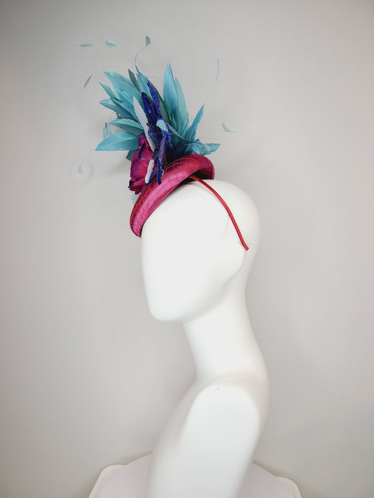 kentucky derby hat fascinator fuchsia magenta satin with painted magenta blue rose with teal blue feathers light blue royal blue leaves